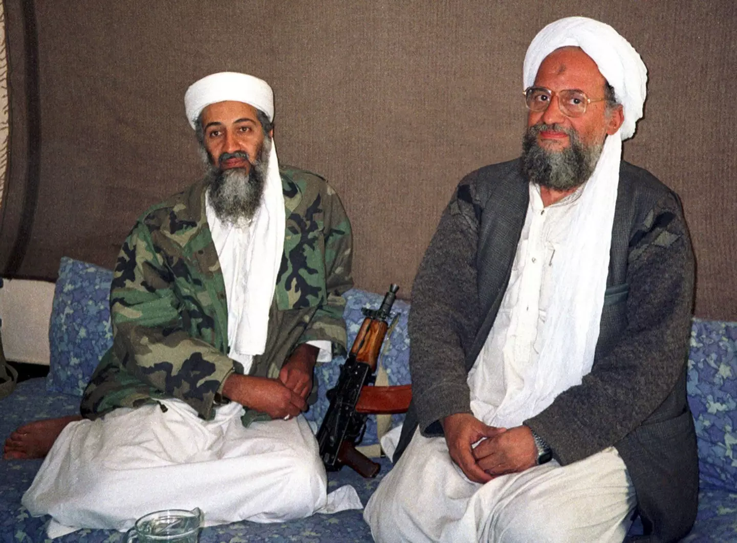 Ayman al-Zawahiri sitting next to Osama bin Laden.