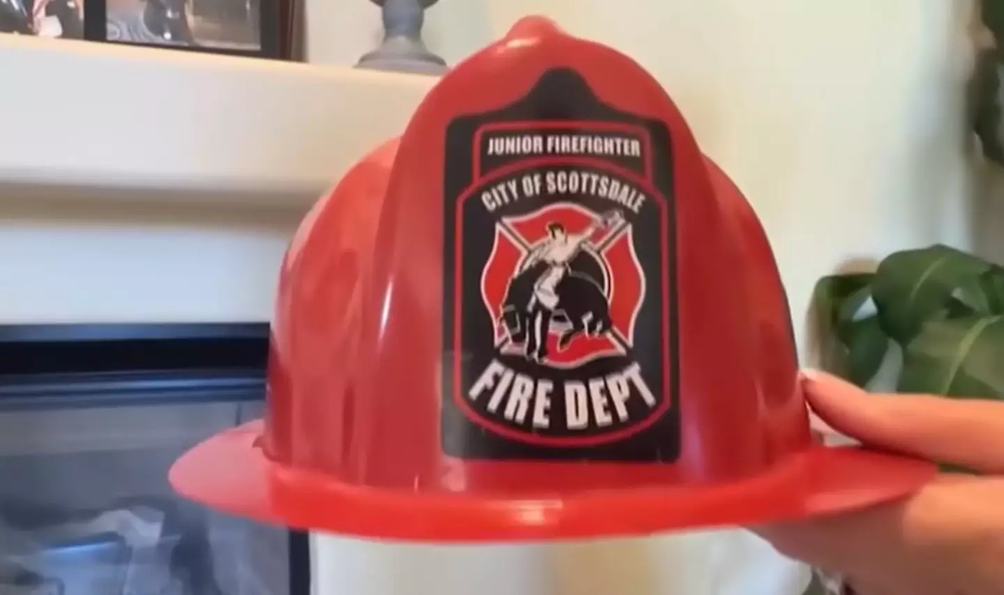 The trapped child was given a firefighter's hat to mark her bravery. (On Your Side/Arizona's Family/3TV/CBS 5)