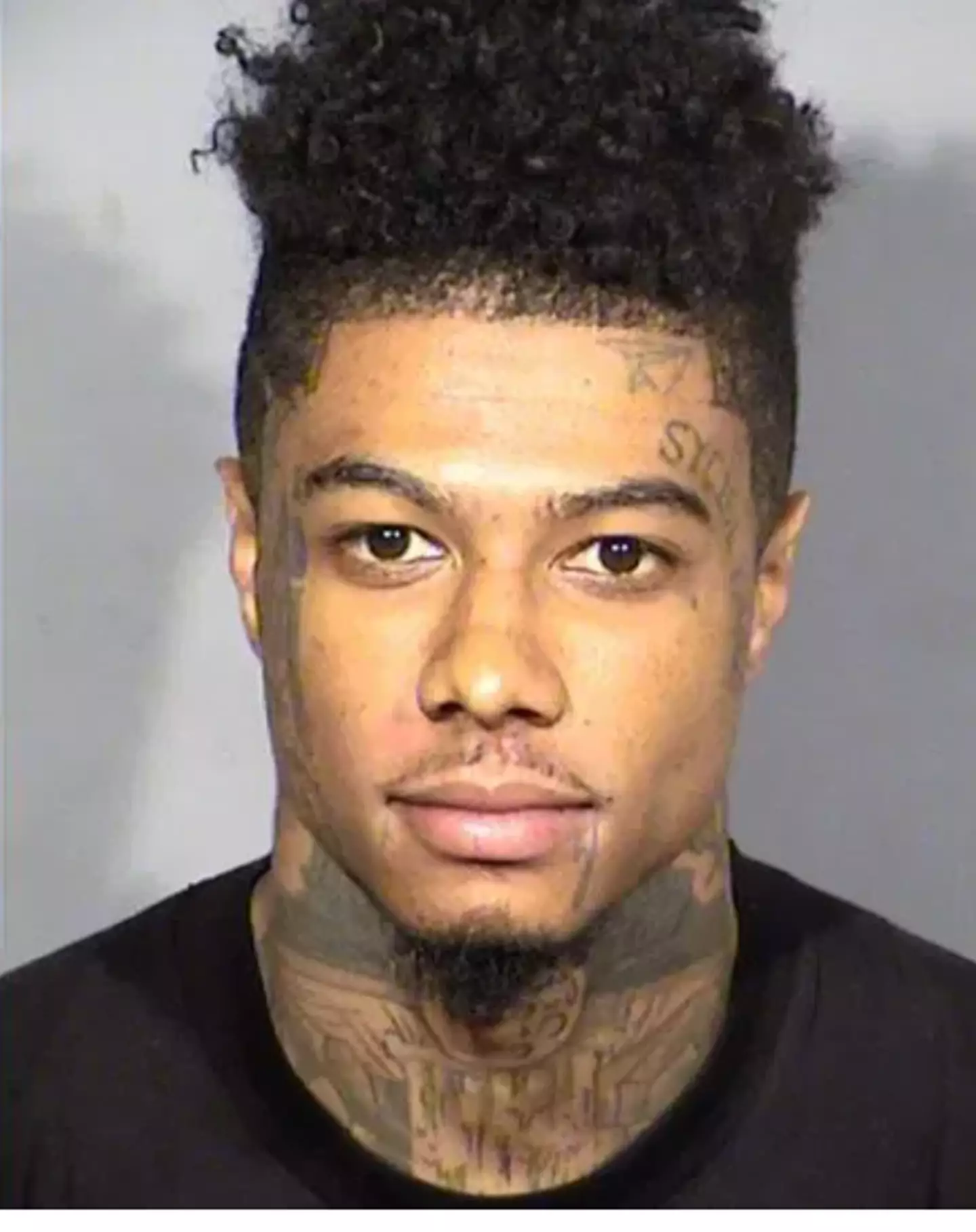Rock revealed that she had got a tattoo of Blueface’s mugshot on her face.