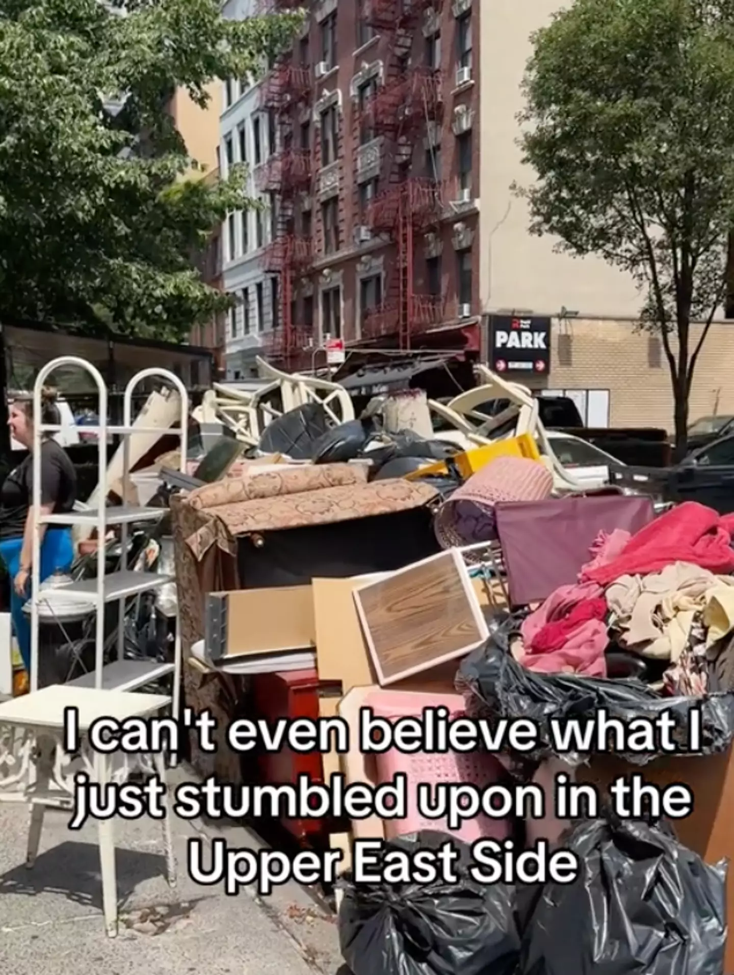 Nichole was walking through the city’s Upper East side when she found a massive mound of household items on the street. (TikTok/@nycnichole)