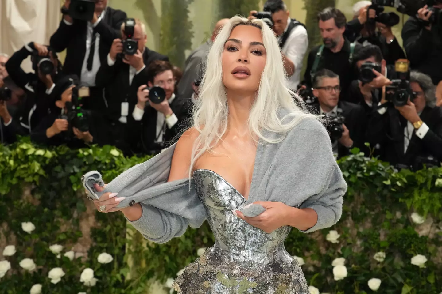 Kim Kardashian worse a corset-style dress, but also with a shawl (Jeff Kravitz/ FilmMagic/ Getty Images) 