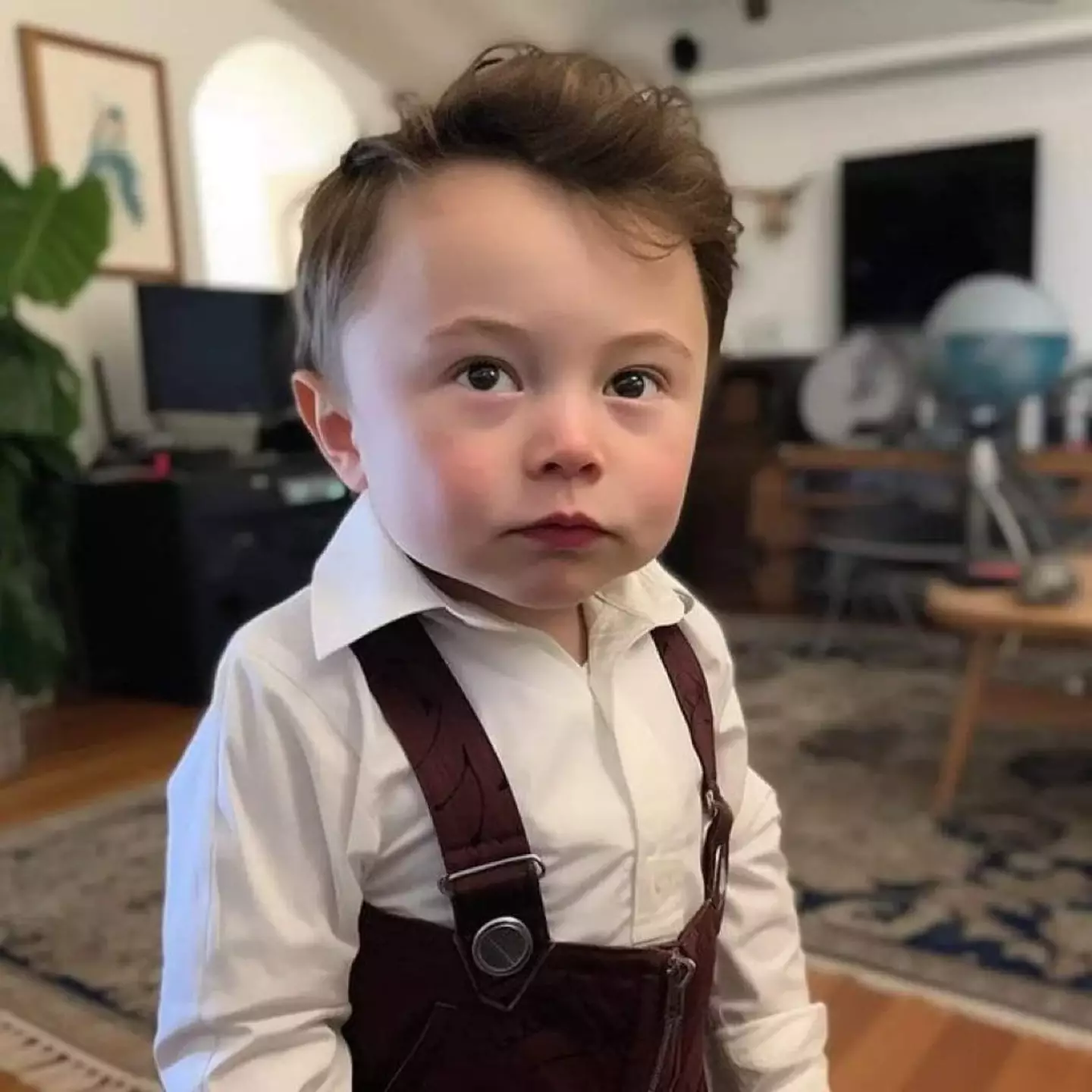 The AI-generated image shows a baby Elon Musk in a wide-collar shirt along with his trademark haircut.