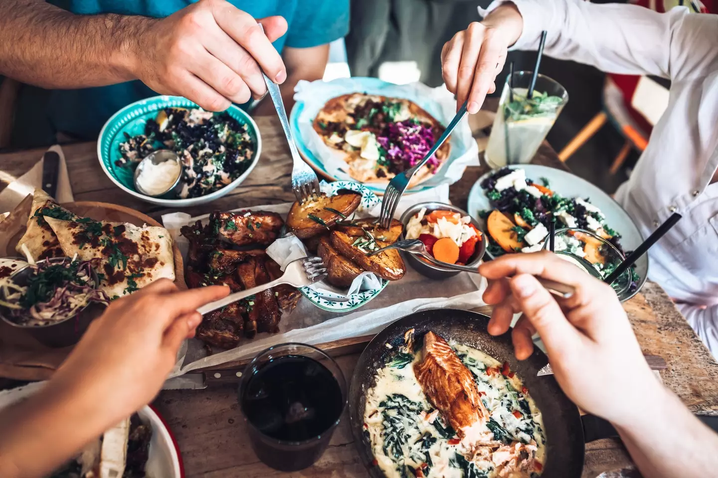 A server took to TikTok to complain about a group of people wanting a table shortly before closing time. (Getty Stock Image)