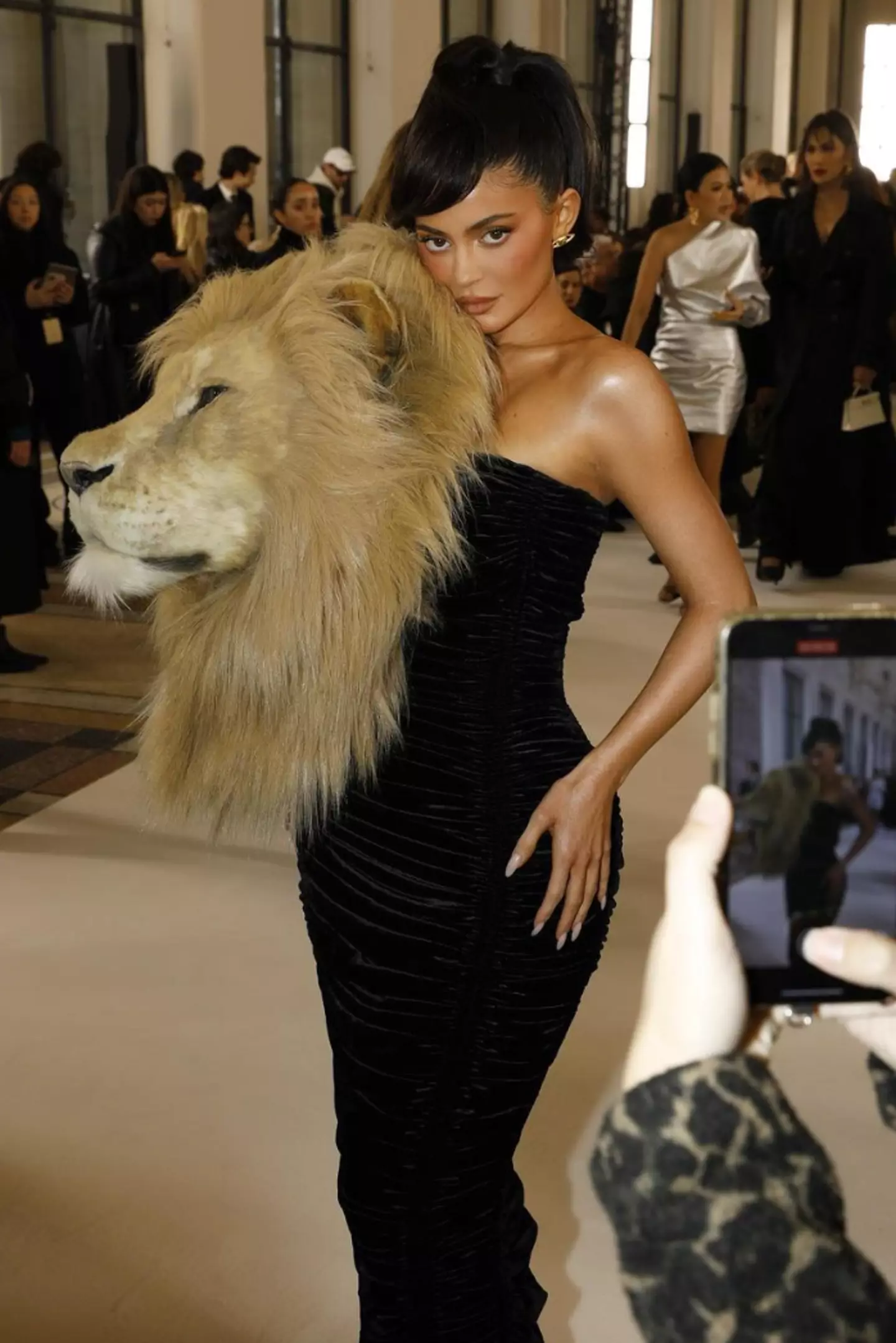 Kylie Jenner was criticised on social media for wearing a faux 'lion's head' to a fashion show this week.
