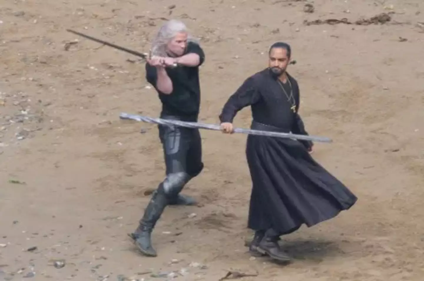 Hemsworth as Geralt in a fight with Vilgefortz. (SplashNews)