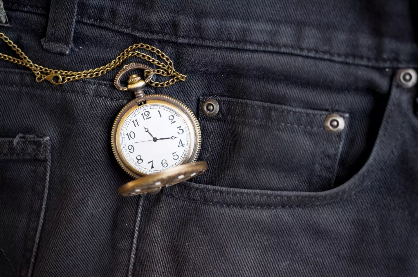 It turns out that the tiny pocket is never found on suit trousers because a pocket watch would be part of the inside of a jacket for formal wear. (Getty Stock Image)