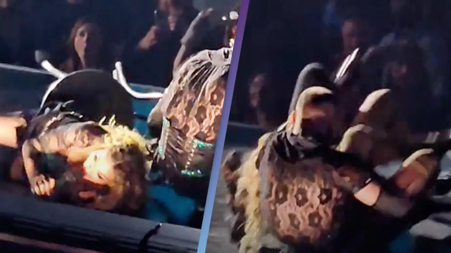 Madonna falls on stage after dancer trips during concert
