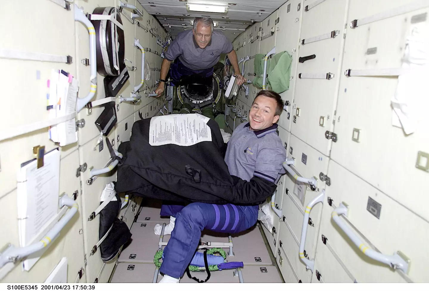 Cosmonauts on board the ISS. (NASA / Handout / via Getty)