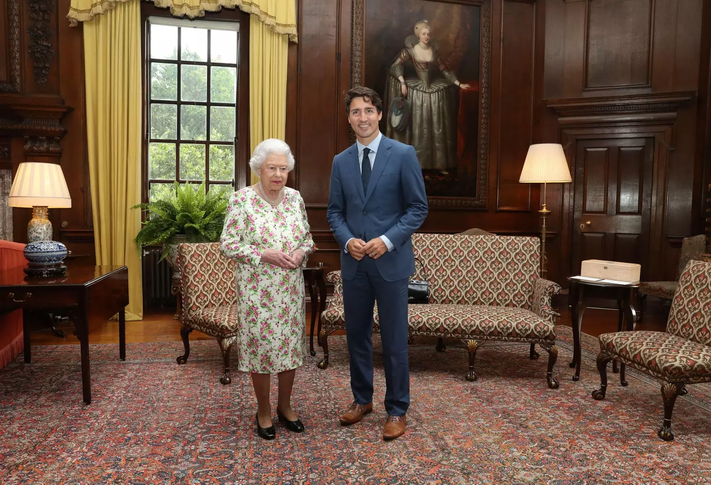 Trudeau and the late Queen Elizabeth II.