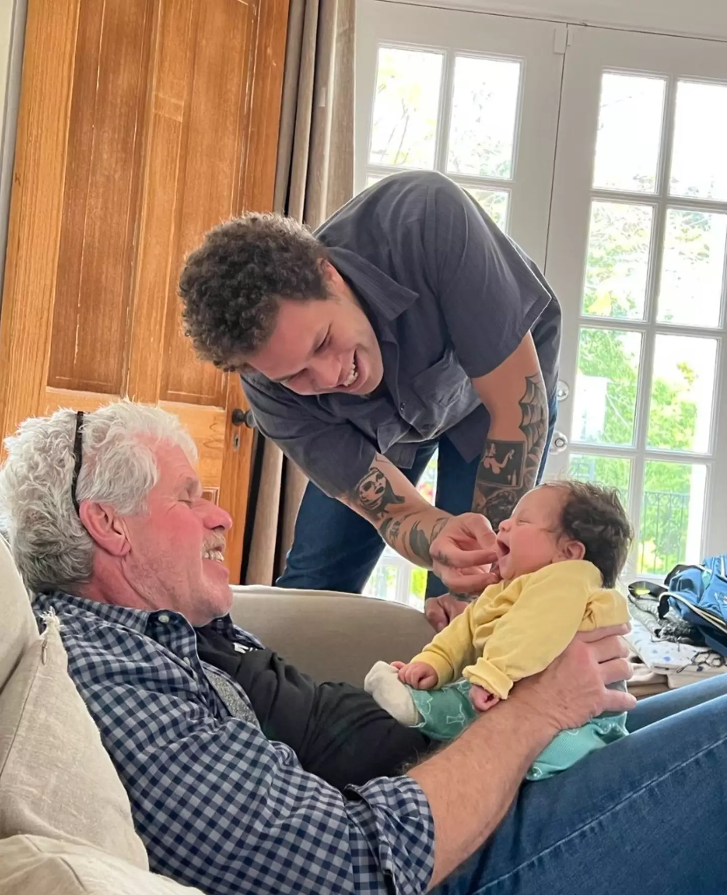 Perlman with his son and grandson.