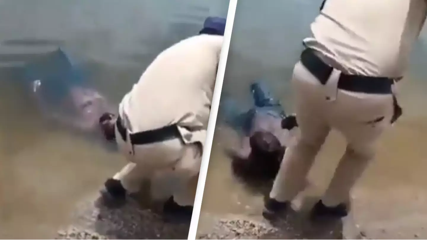Clip shows police retrieving corpse from pond only to find man was still alive