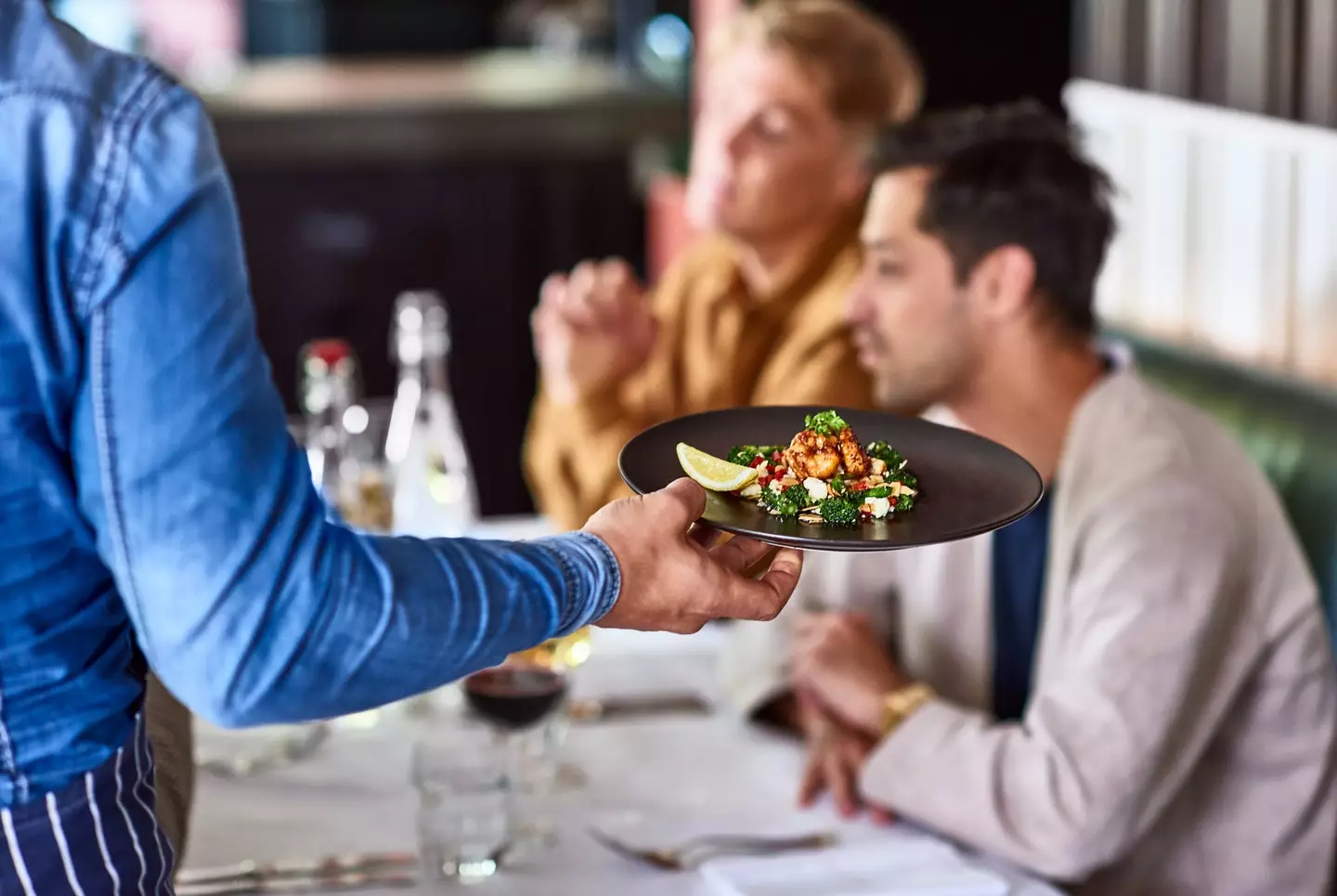People have been left divided by the server's opinion. (Getty Stock Image)