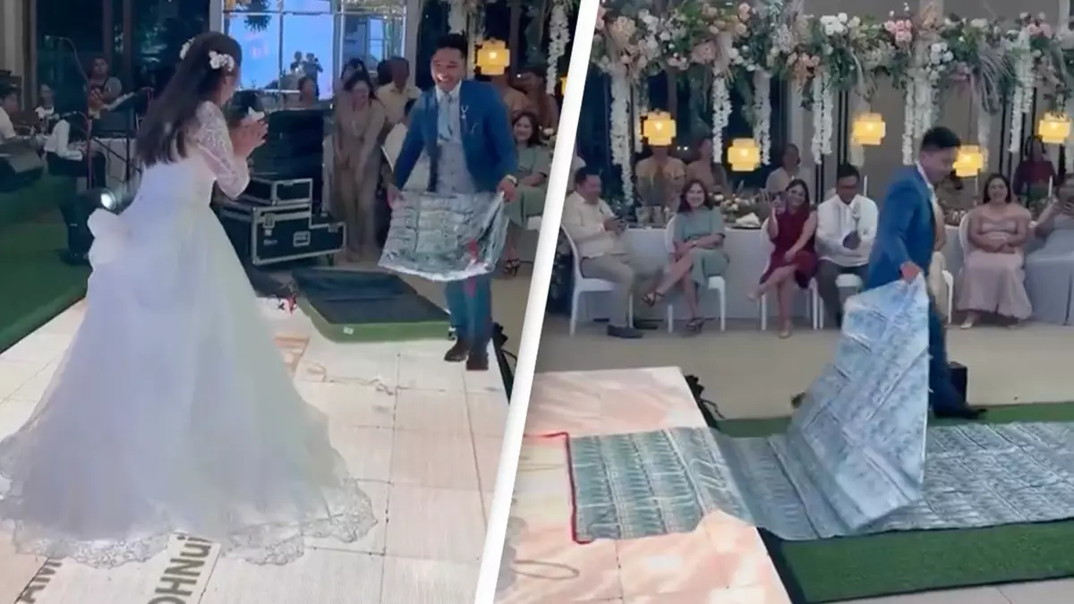 Groom leaves people shocked as he gifts bride cape made out of $17,000 in cash at wedding