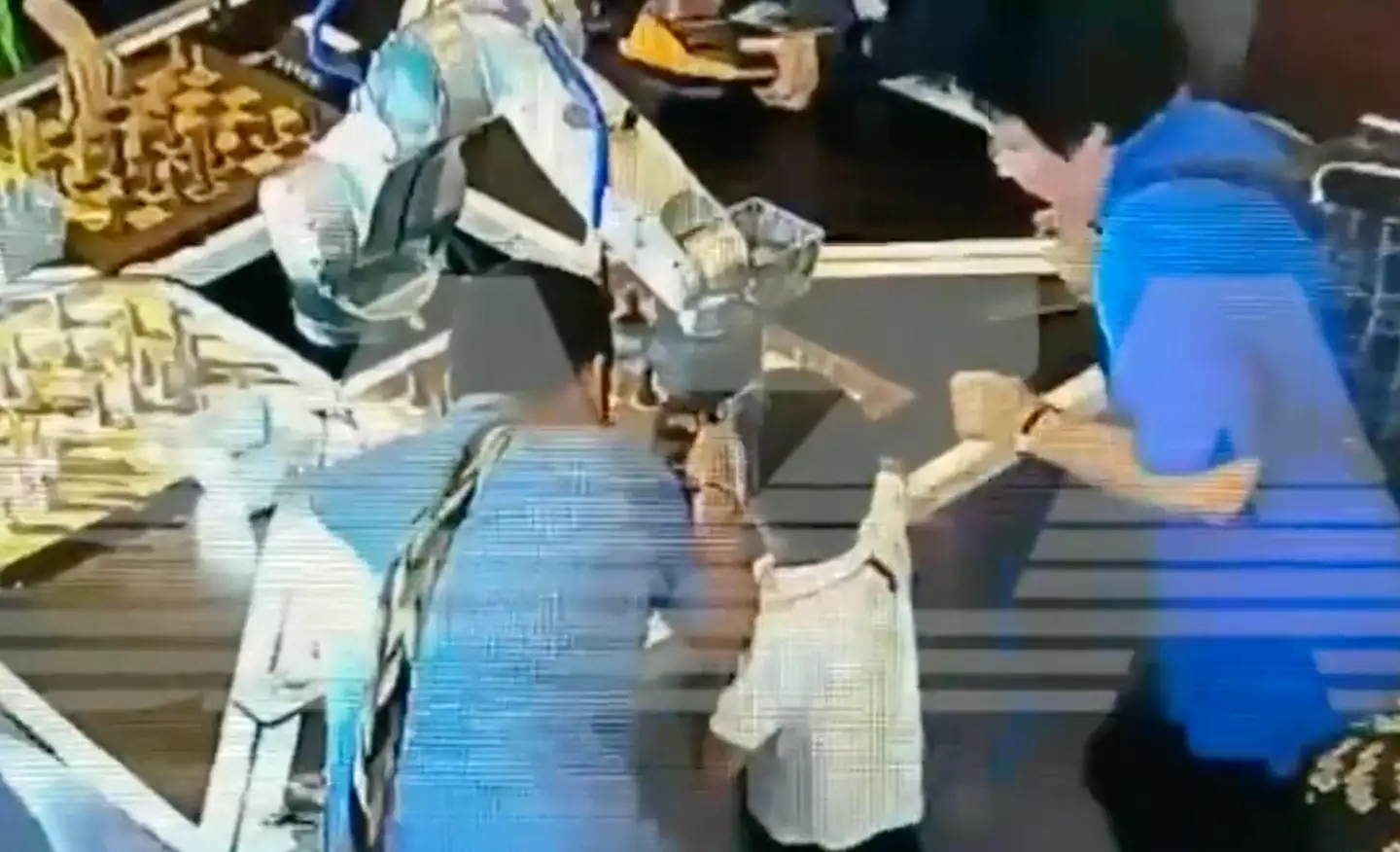 Adults rushed to help the child when they realised the robot had his finger.