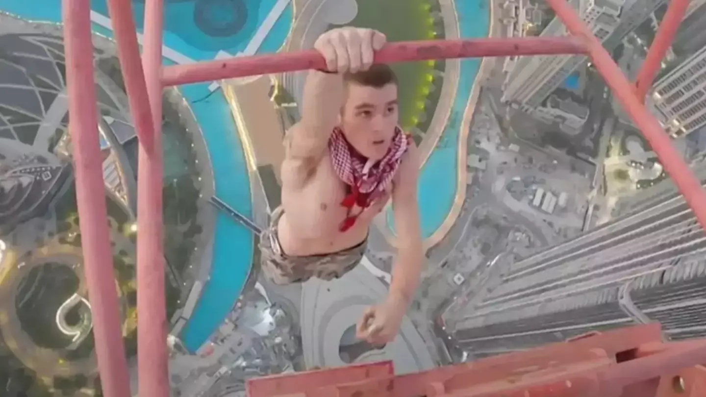 Free climber didn't realise crane had been covered in grease before scaling 1,200ft above Dubai