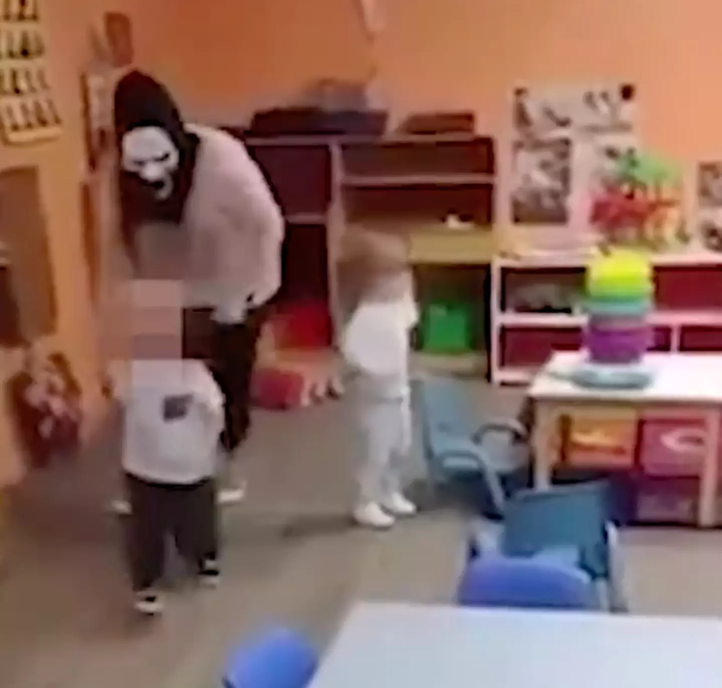 In another part of the video, the woman chases a little kid.