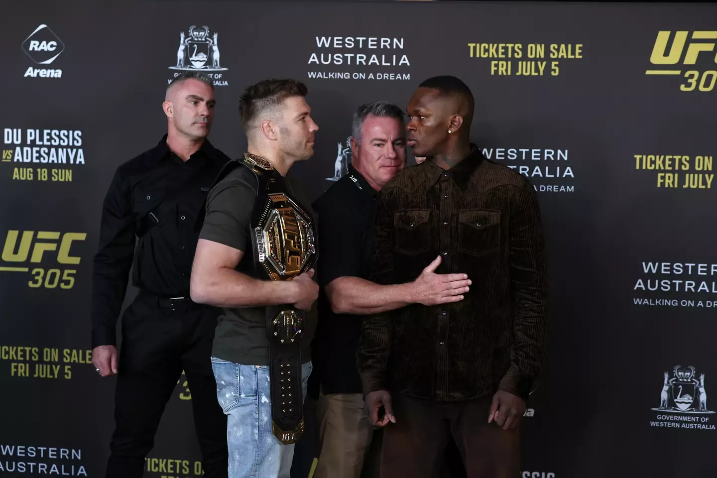 Dricus Du Plessis and Israel Adesanya were separated as they faced off ahead of UFC 305. Image: Getty