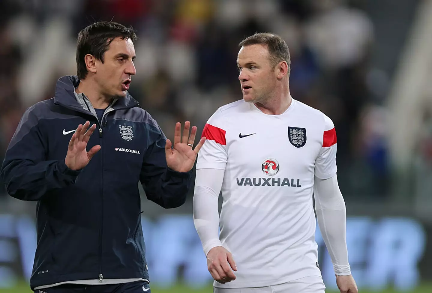 Rooney and Neville played together for Manchester United and England (Image: Getty)