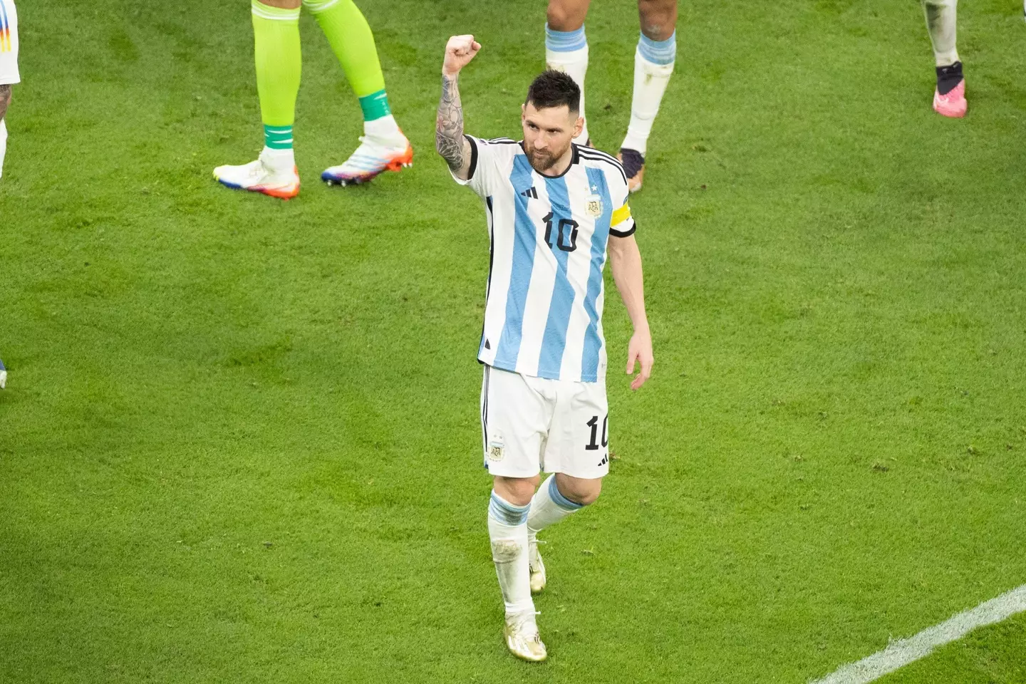 Lionel Messi celebrates on the pitch after Argentina beat Croatia. Image: Alamy 