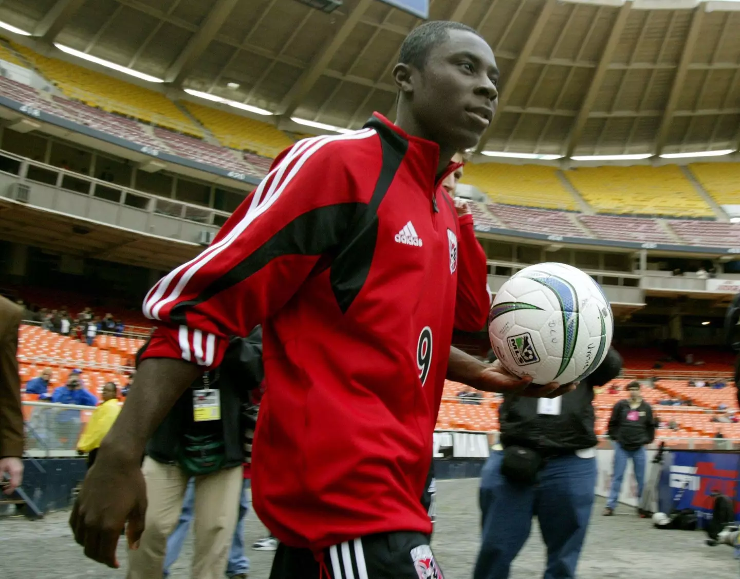 A 14-year-old Freddy Adu gets ready to warm up ahead of his first professional game. He was "very nervous". Image credit: Alamy