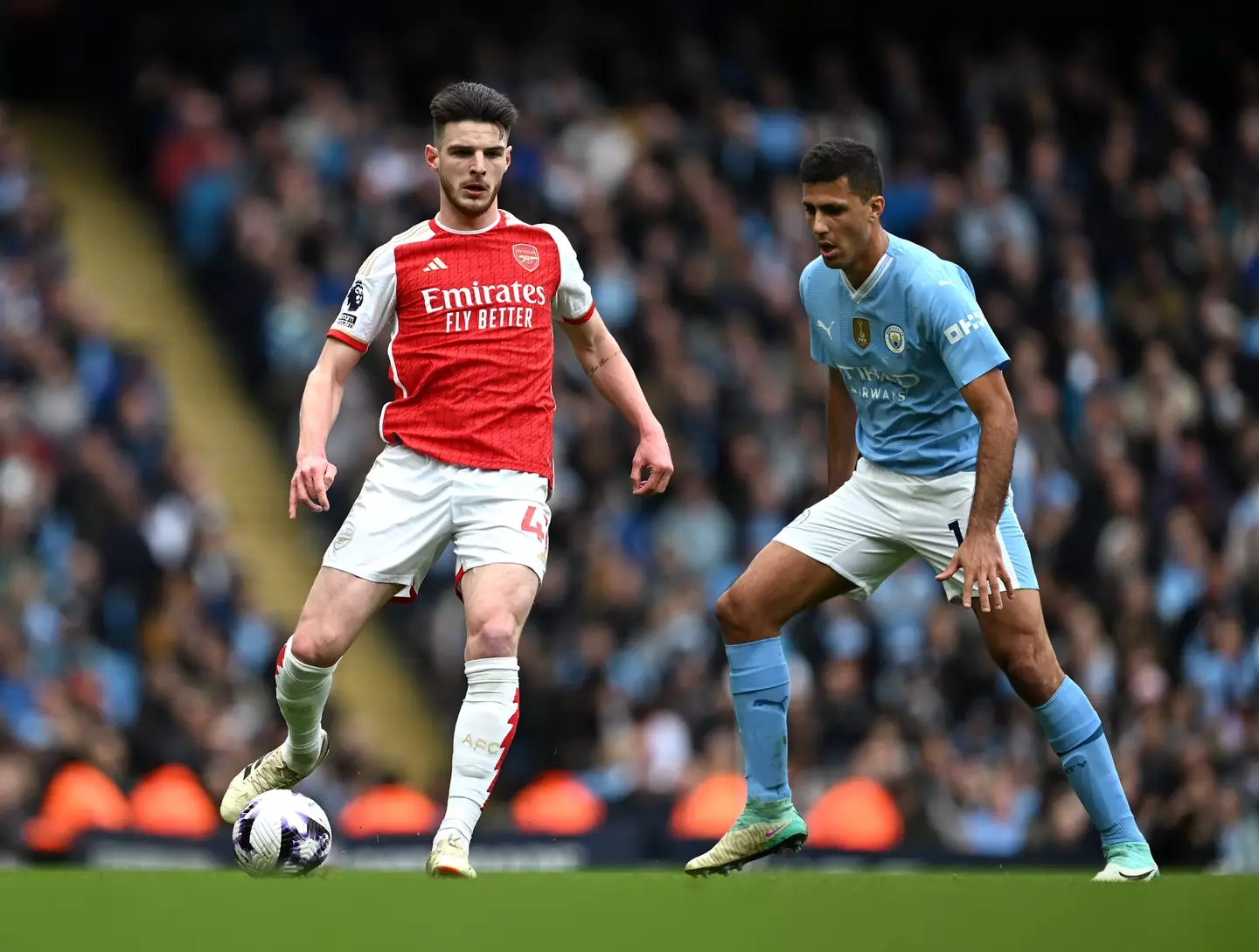 Declan Rice and Rodri in action during Manchester City vs. Arsenal. Image: Getty
