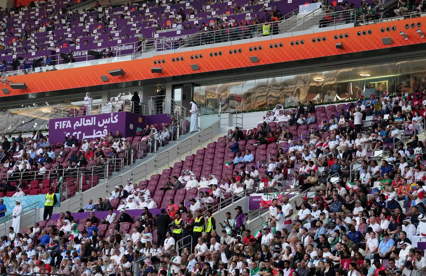 Empty seats in the stands during the Group B match between England and Iran at the Khalifa International Stadium. Image credit: Alamy