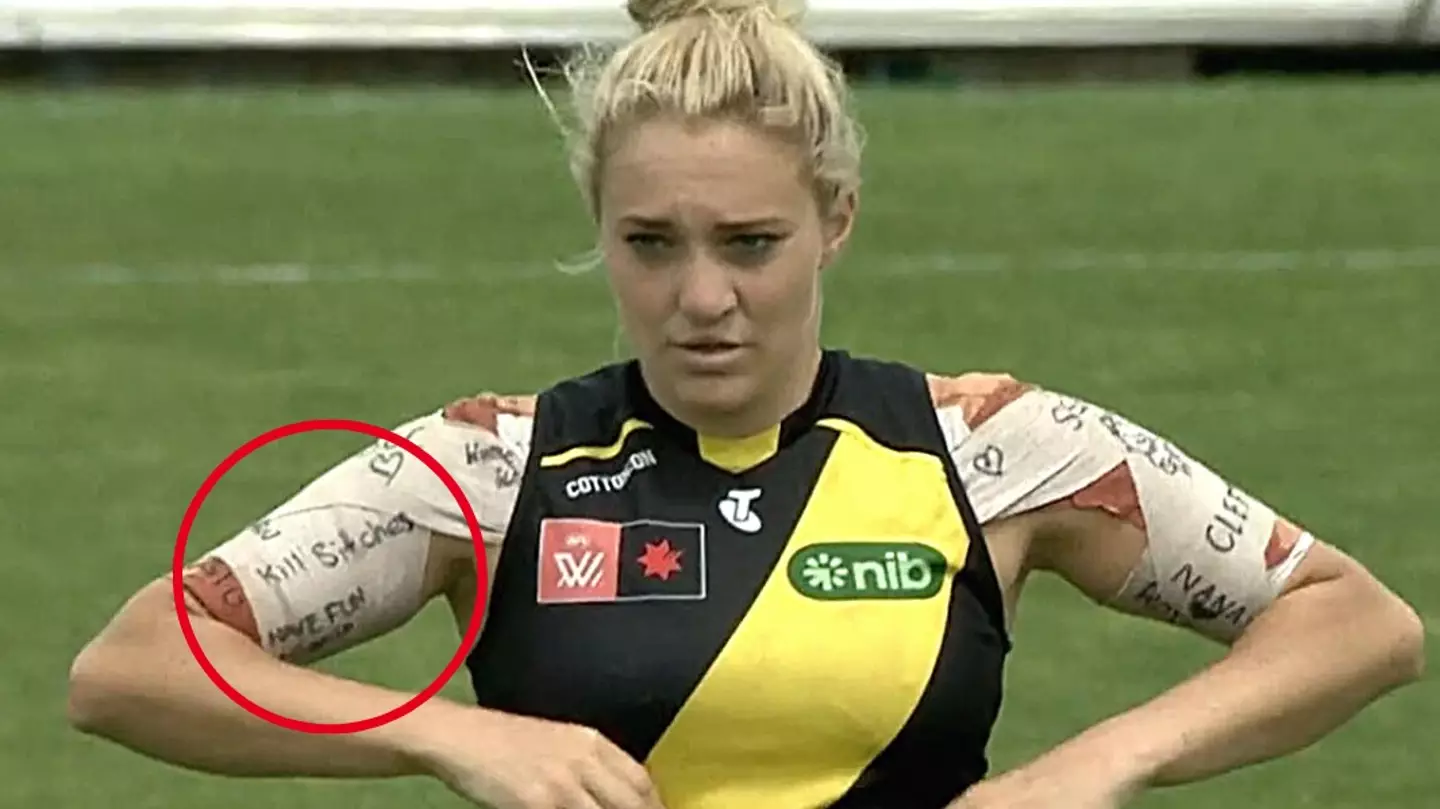 AFLW player apologises over offensive messages written on her taping