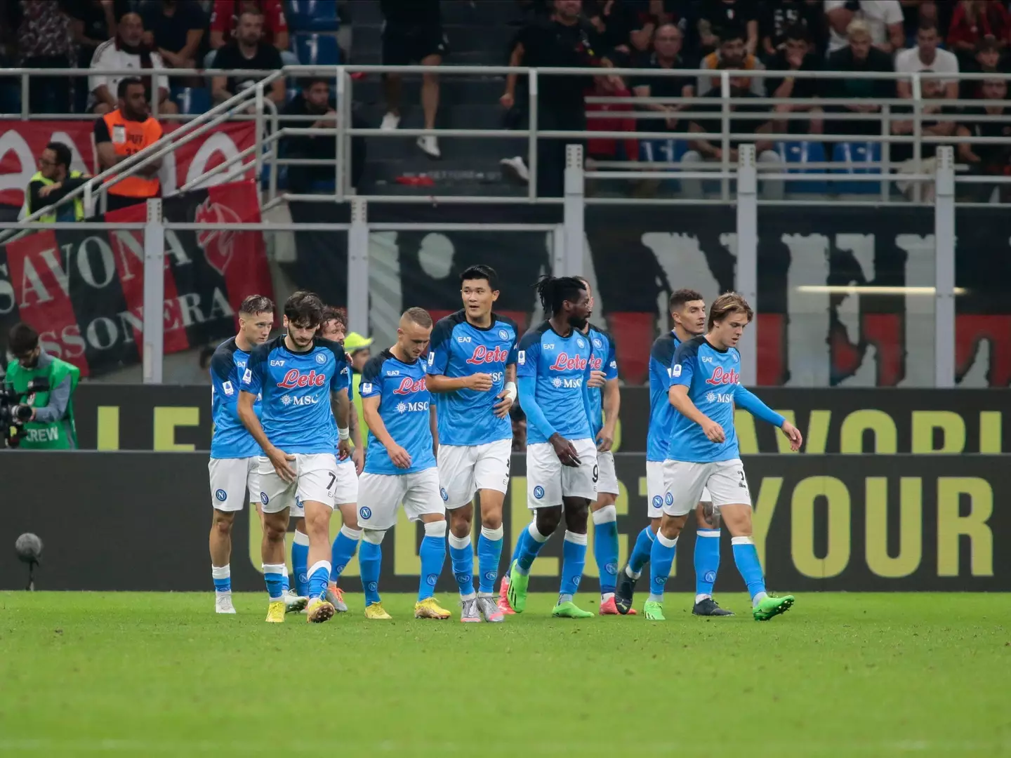 Napoli players celebrate during a Serie A match against AC Milan (