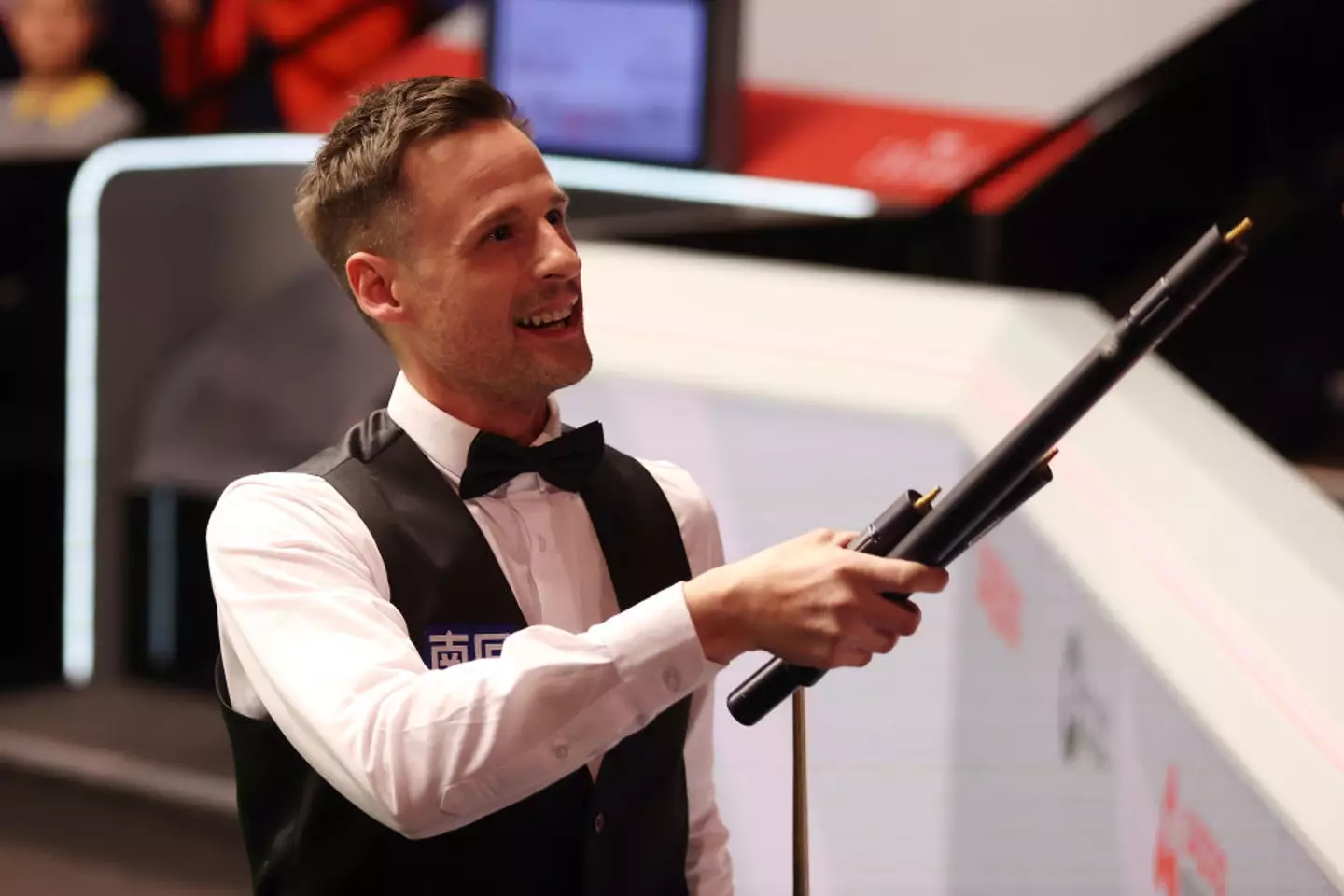 David Gilbert celebrates after beating Stephen Maguire in the World Snooker Championship quarter-finals (