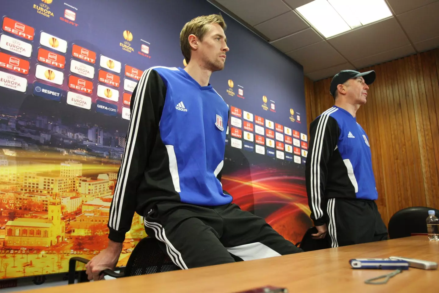 Crouch and Pulis at a press conference. (Image