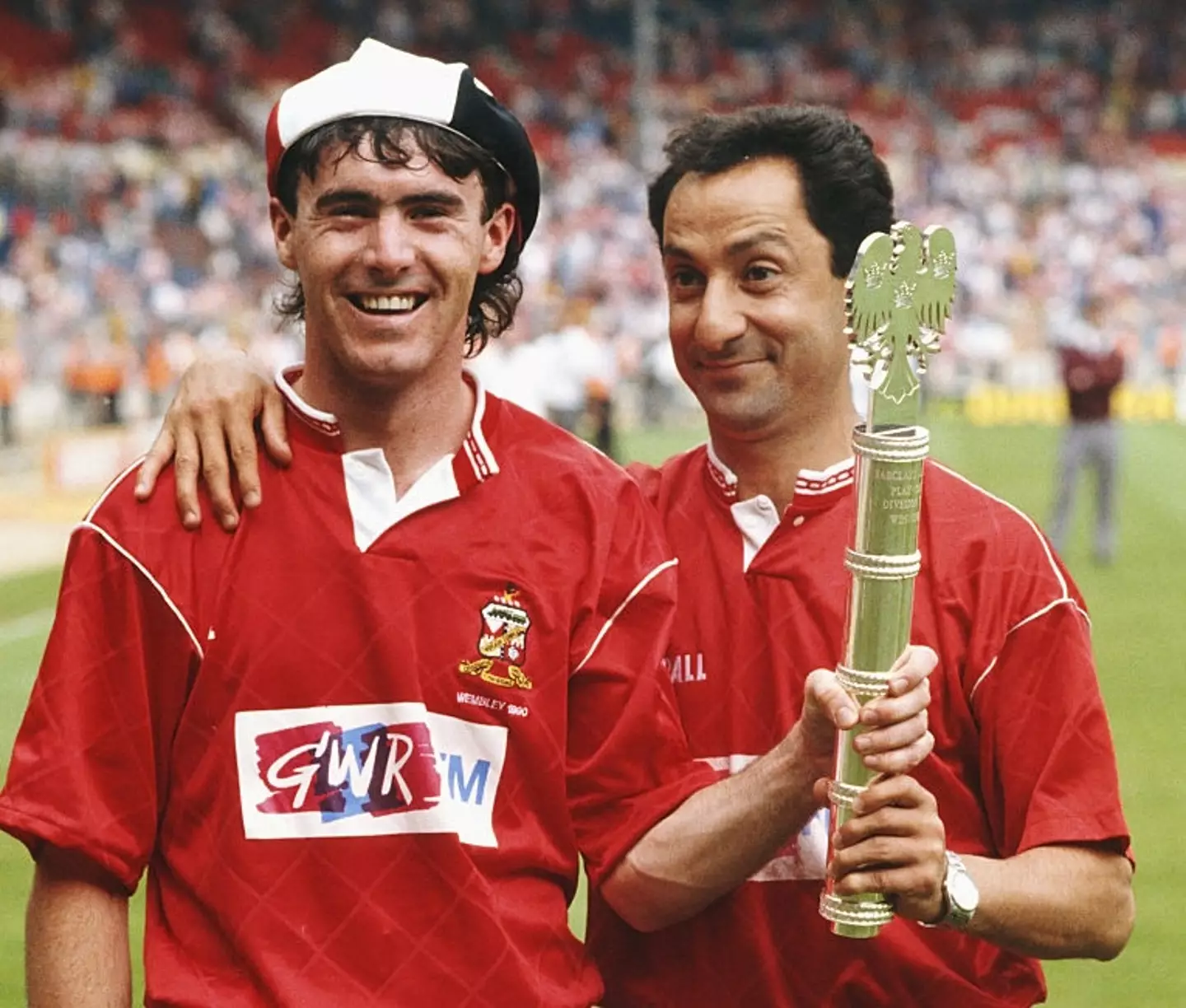 Swindon earned promotion under manager Ossie Ardiles (right) in 1990 before their subsequent punishment (
