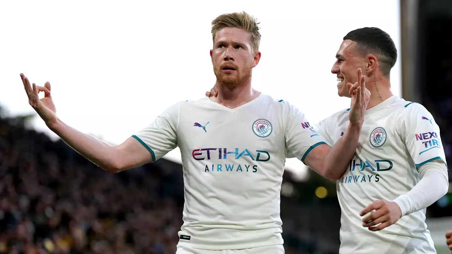 Kevin De Bruyne (left) celebrates scoring their side's third goal of the game and completing his hat-trick during the Premier League match at the Molineux.