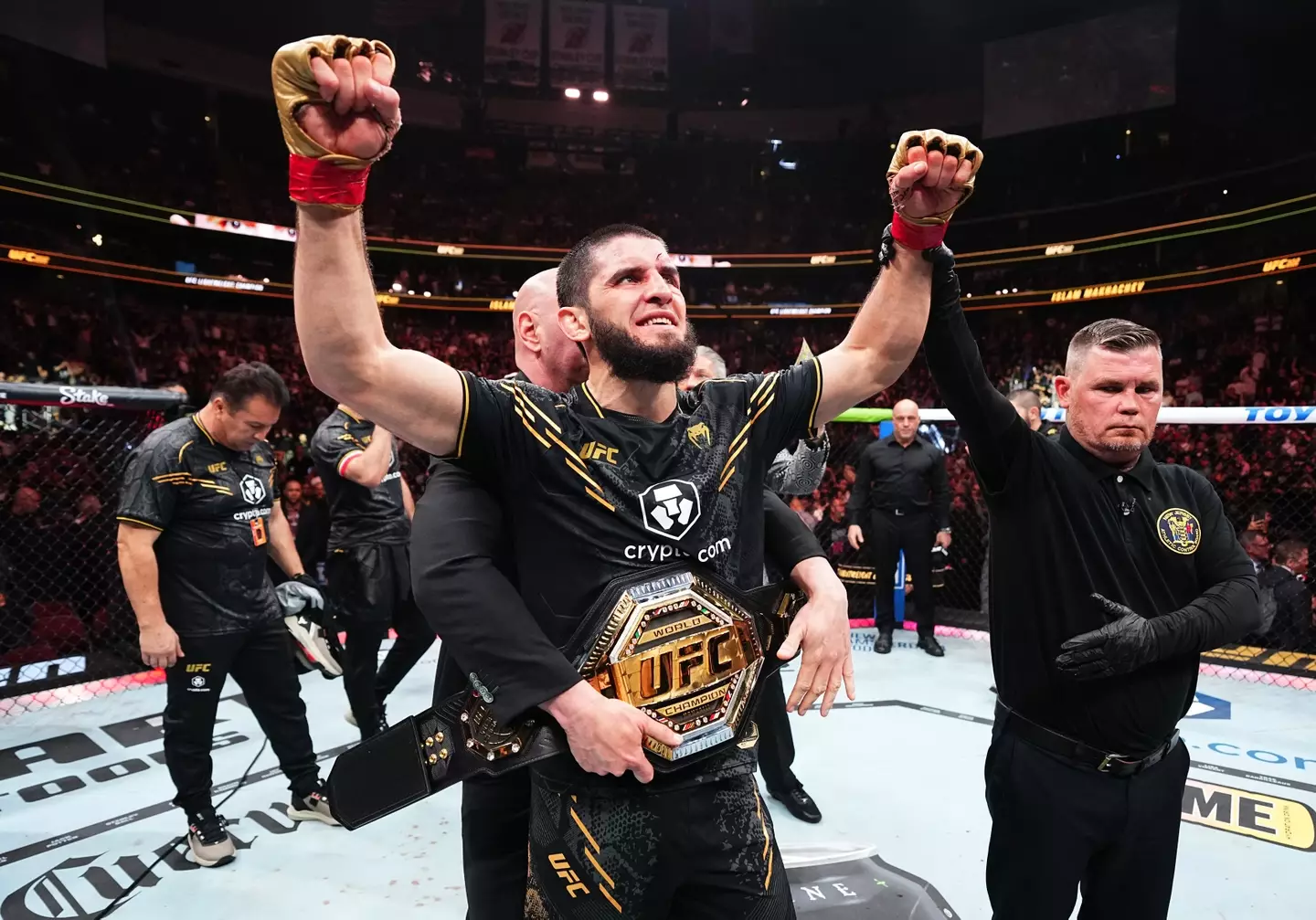 Dana White wraps the UFC title around Islam Makhachev following his win over Dustin Poirier. Image: Getty