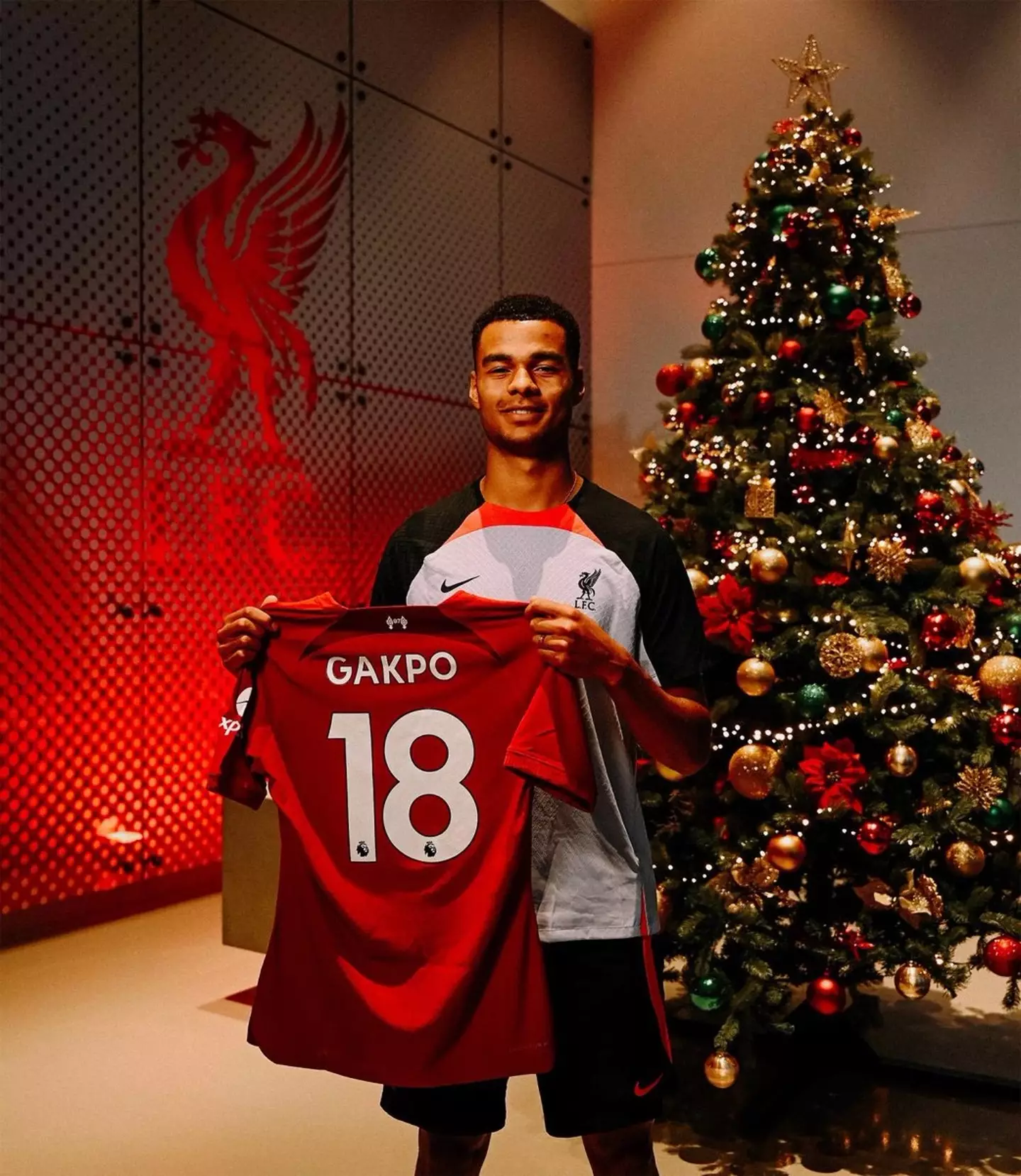 Gakpo with his new shirt. Image: Liverpool FC