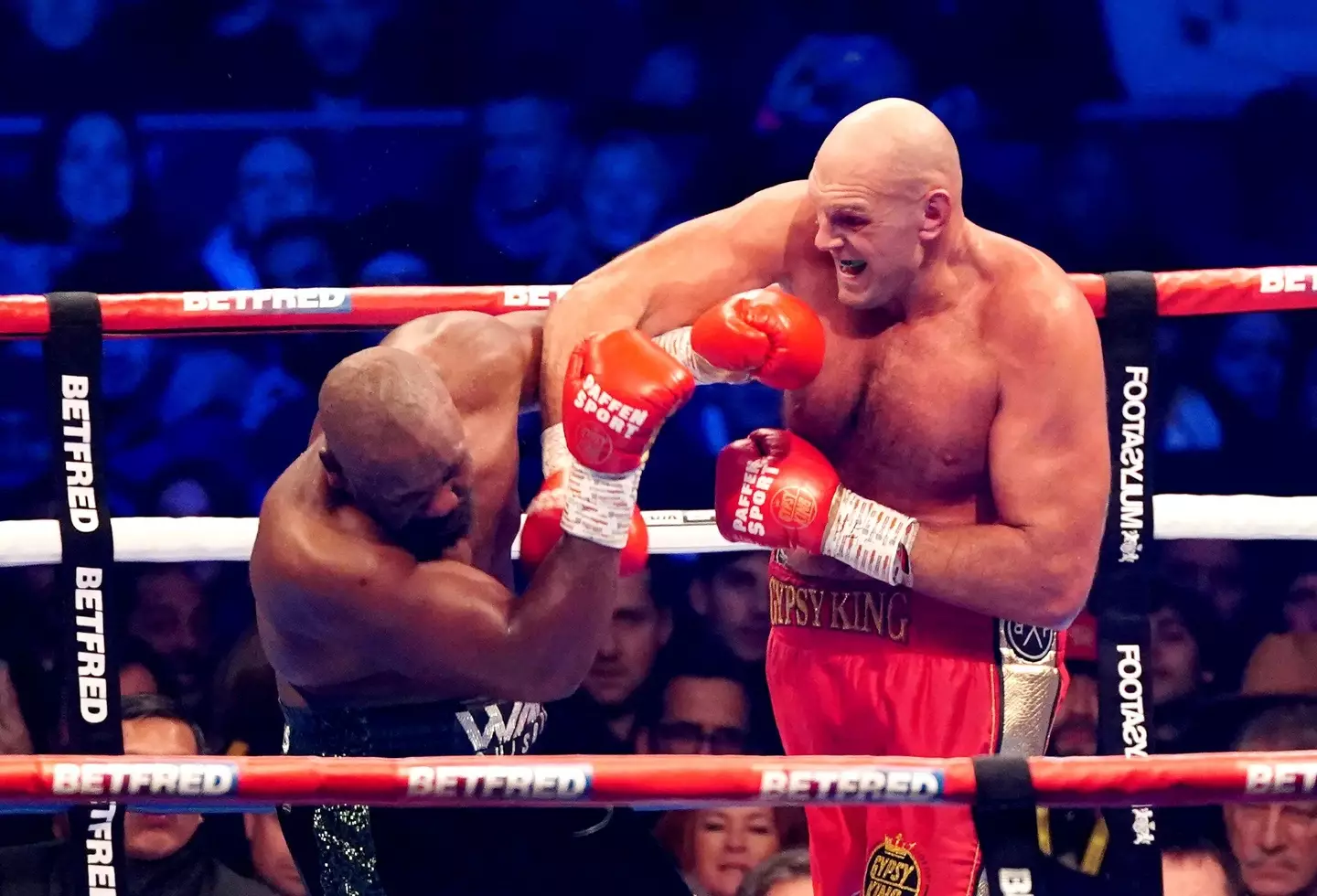 Tyson Fury lands a punch on Dereck Chisora. Image: Alamy 