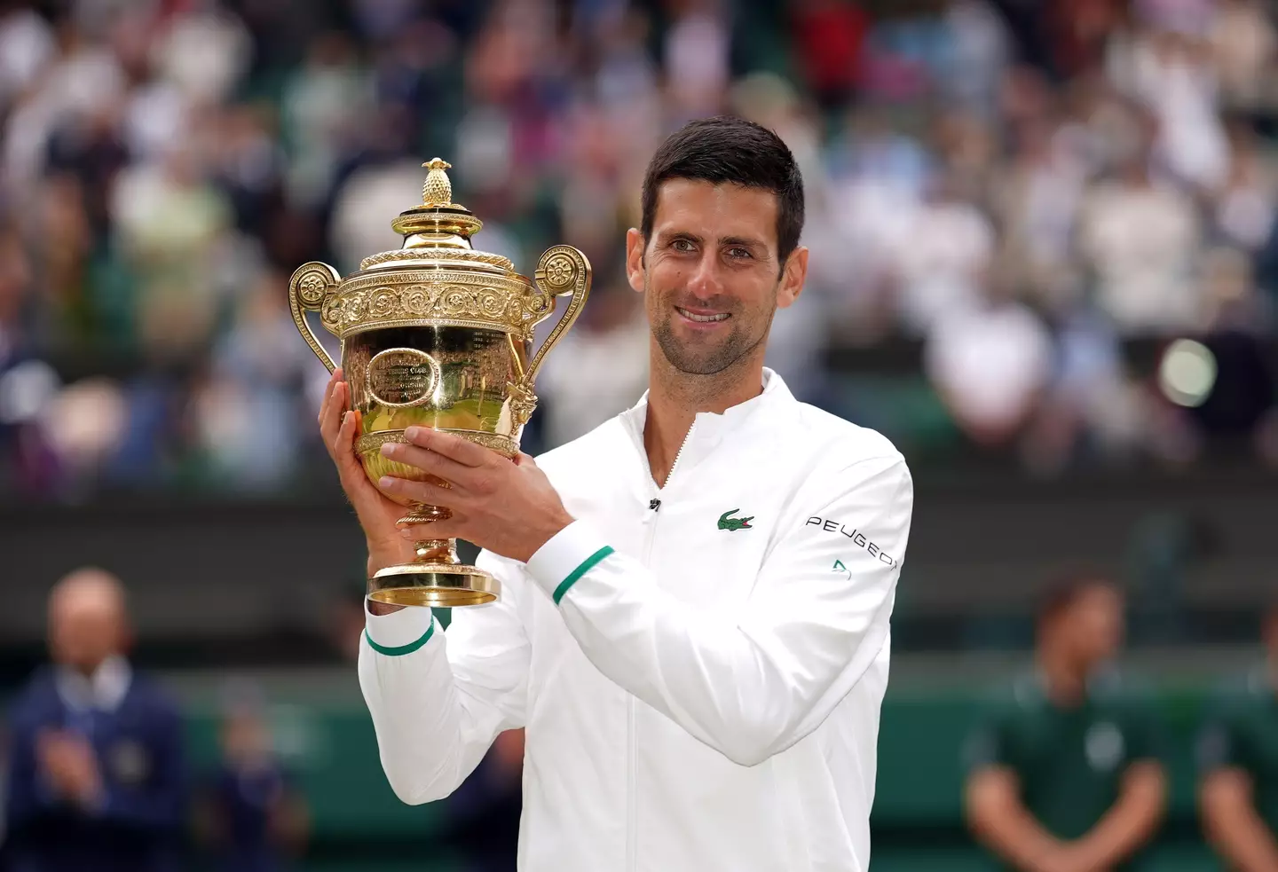 Djokovic with the Wimbledon trophy last year. Image: Alamy