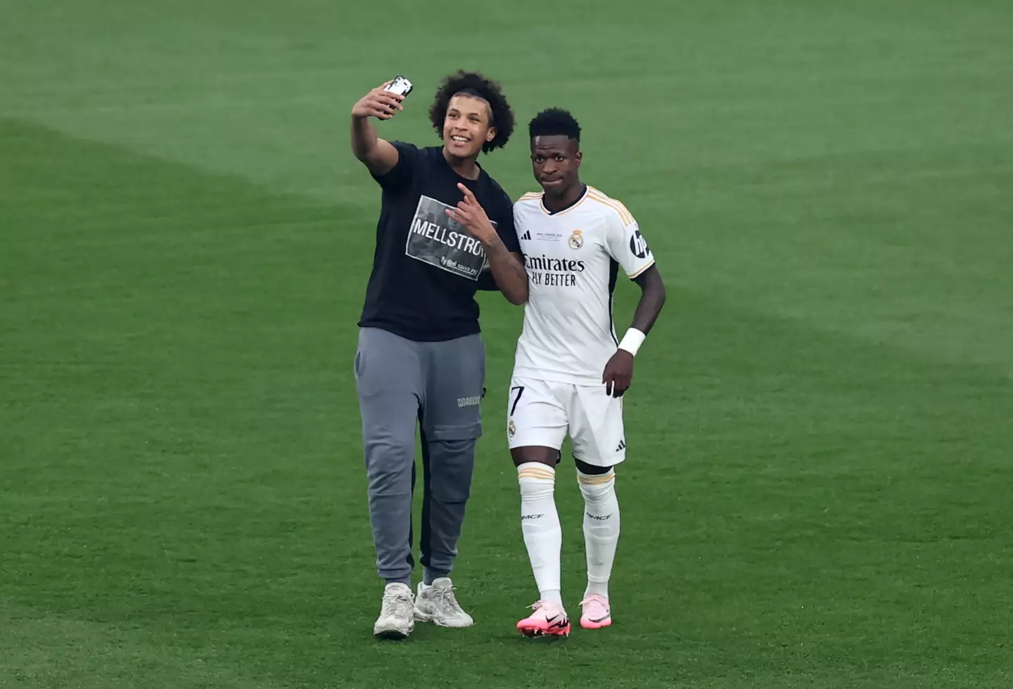 One of the pitch invaders took a picture with Vinicius Jr (Getty)