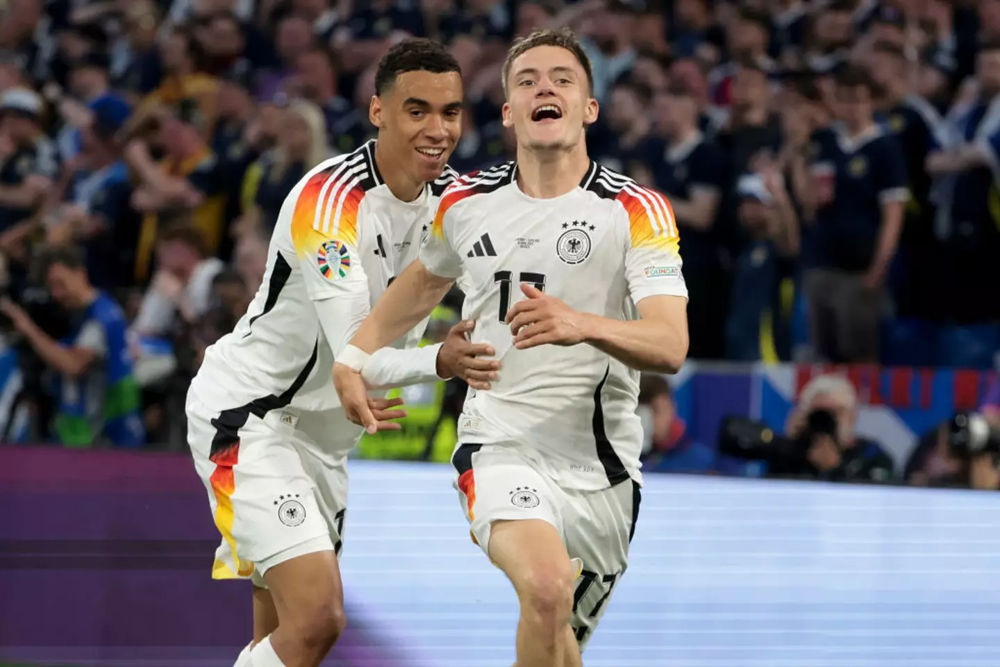 Germany players Florian Wirtz and Jamal Musiala celebrate during their side's 5-1 win over Scotland at Euro 2024 (