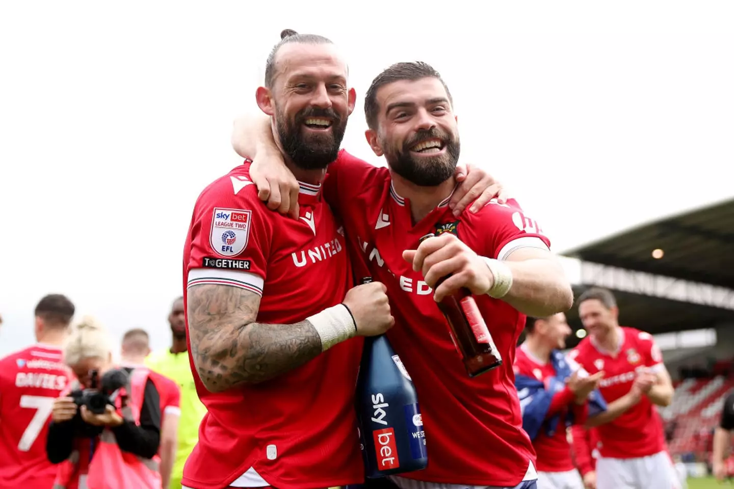 Wrexham's Steven Fletcher and Elliot Lee celebrate promotion from League Two (