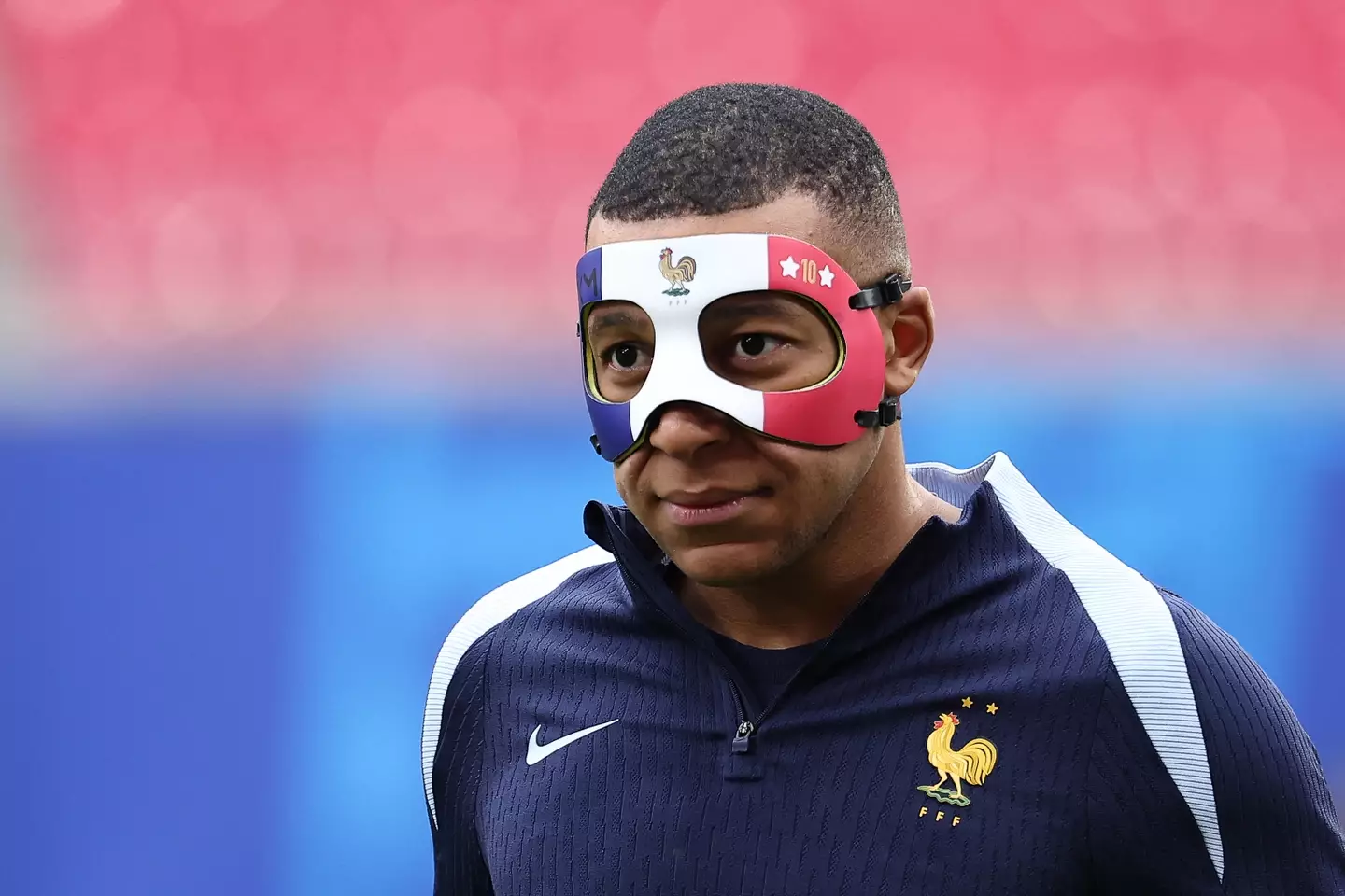 Kylian Mbappe wears his face mask in France training. Image: Getty 