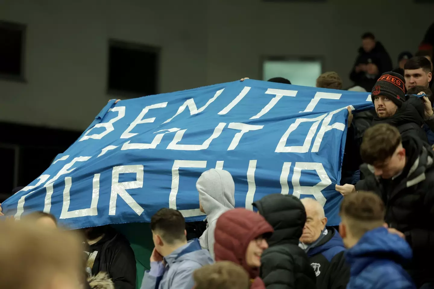 Fans with a banner at the Norwich game calling for Benitez out. Image: PA Images