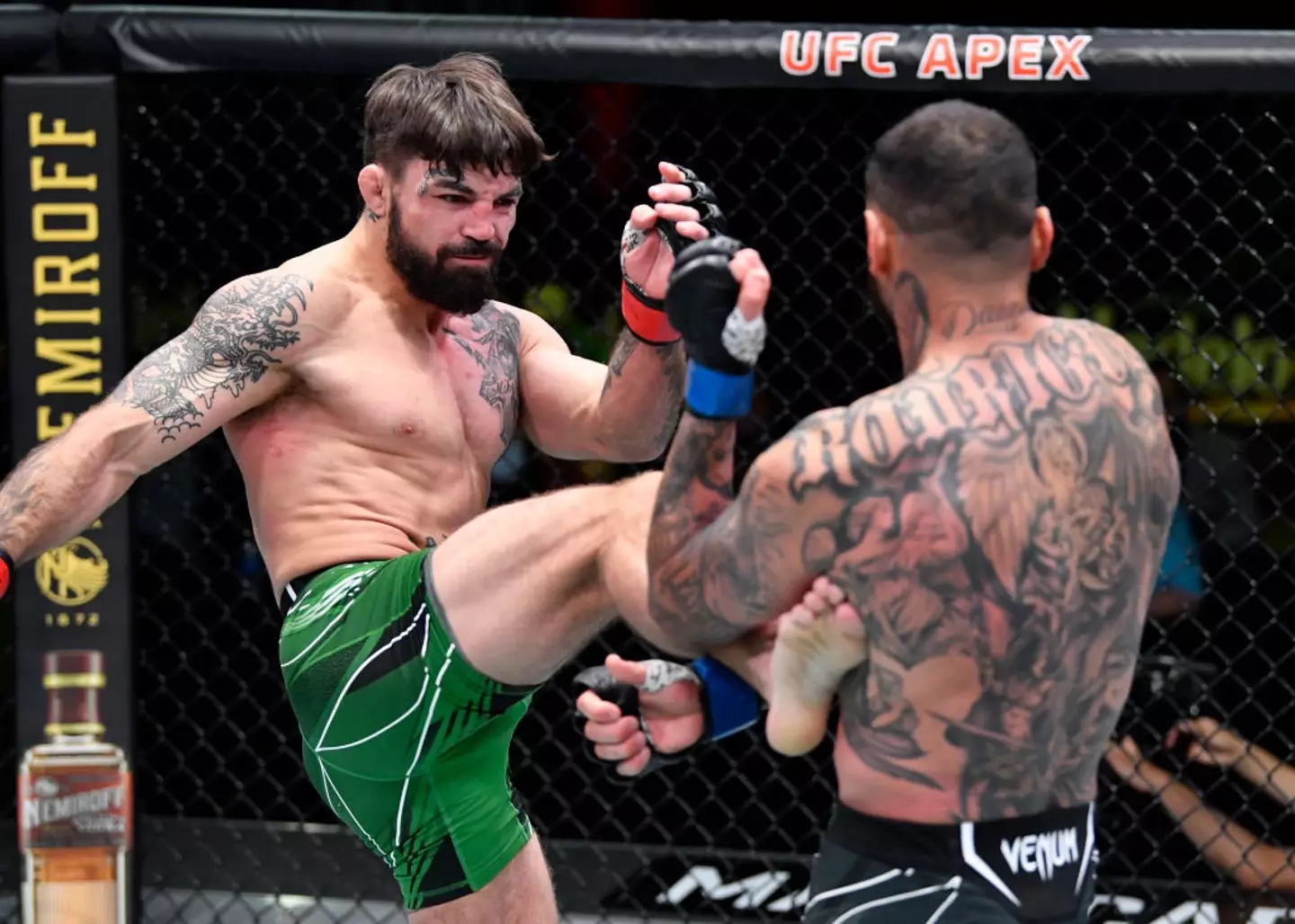 Mike Perry (left) has a professional MMA career of 14-8 (Image: Getty)
