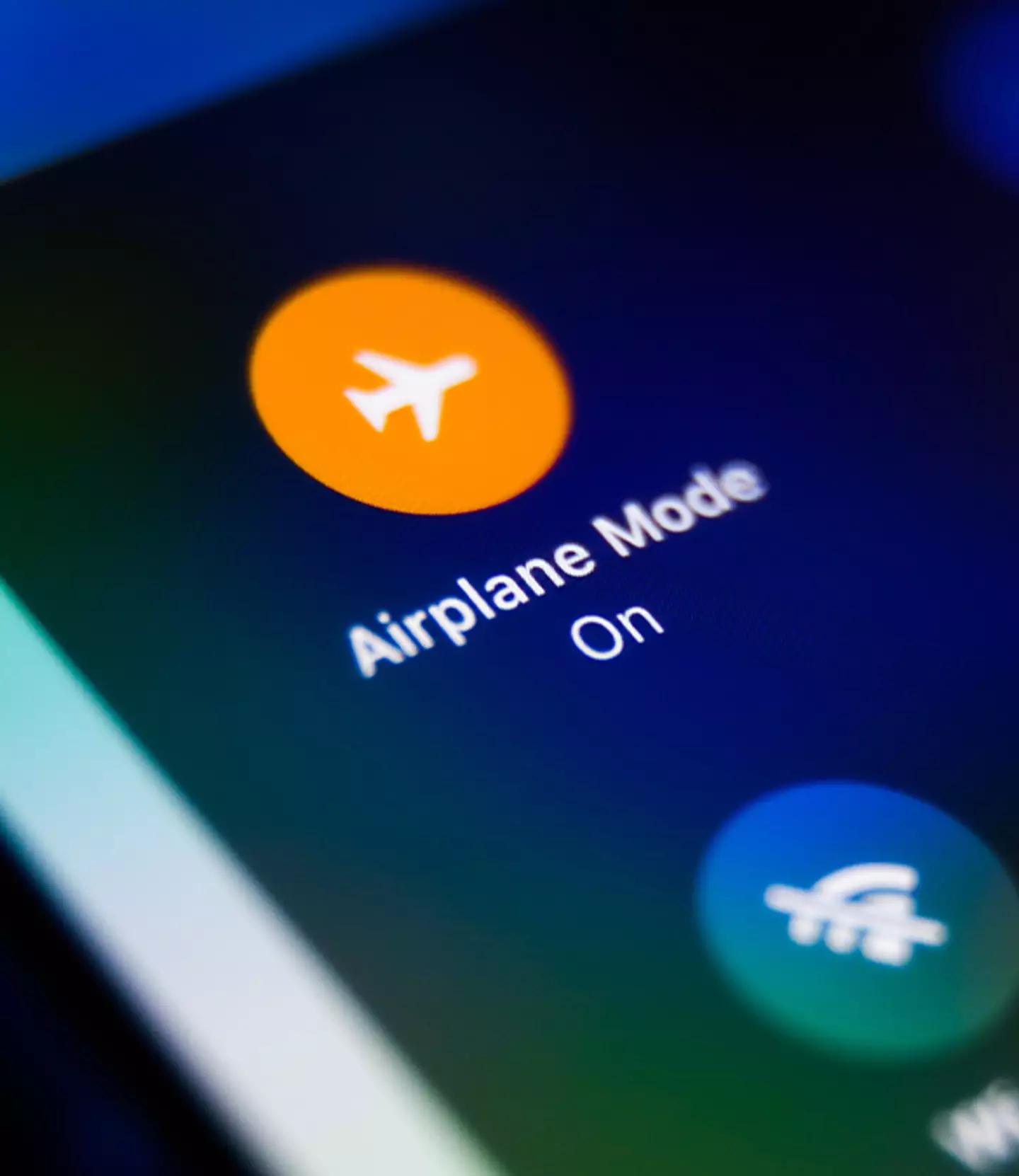 Passengers should keep their smartphones in airplane mode during flights / NurPhoto / Contributor / Getty