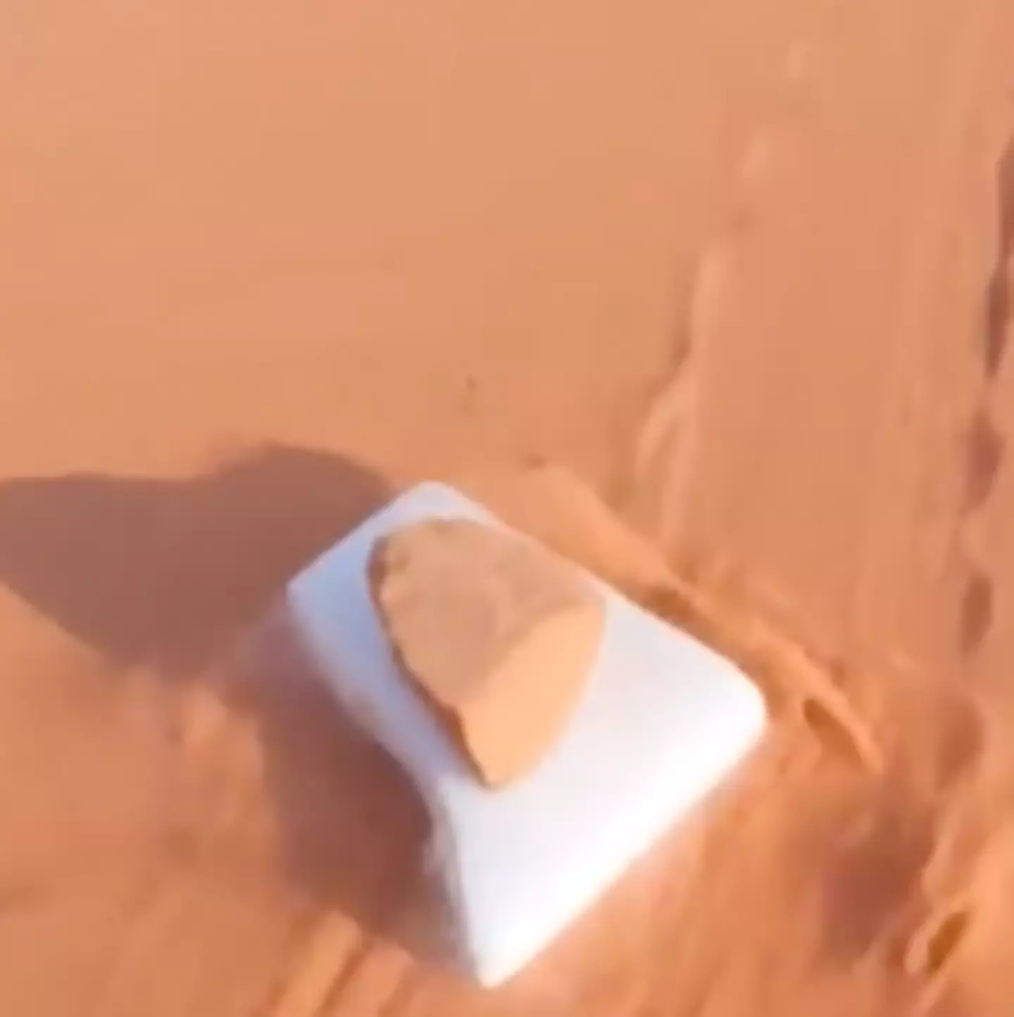 People mind-blown to find out blocks of dry ice can float on sand