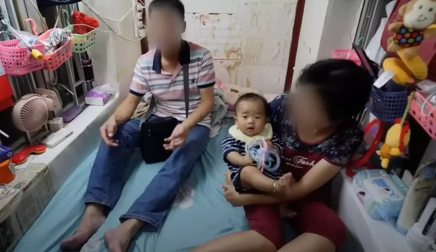 A family living in the homes cramped conditions (Sky News/YouTube)