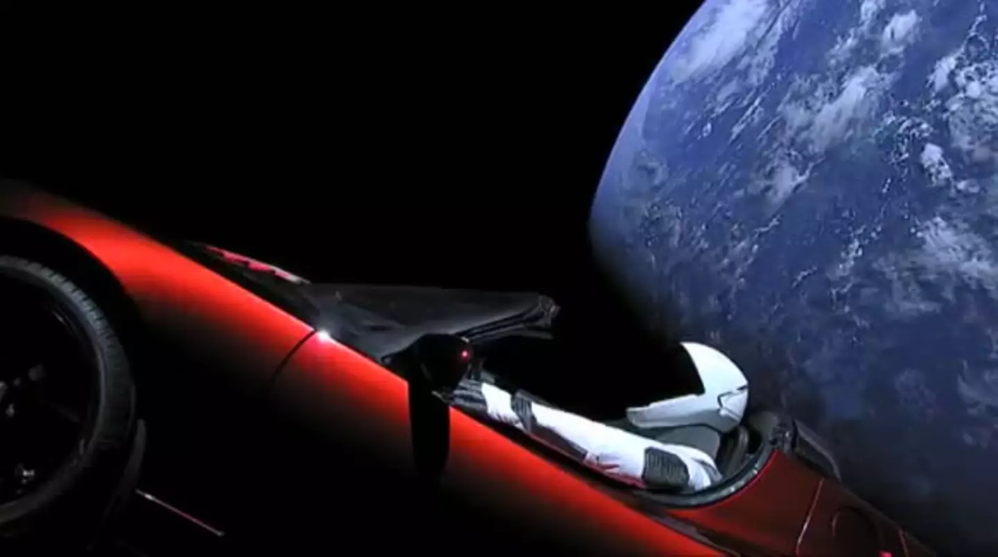 The red Tesla Roadster is not alone, as it also has  a mannequin driver called Starman.