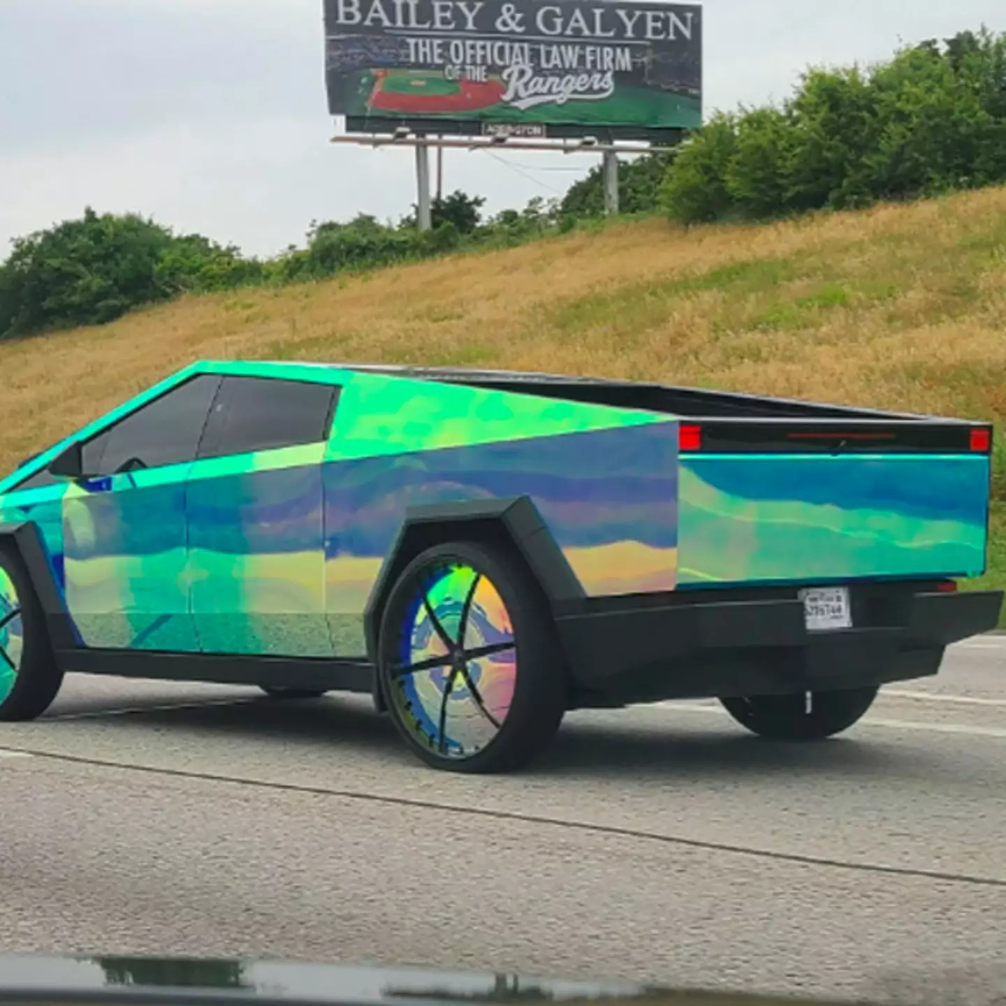 'Cursed', crazy', 'perfect' - people are divided over this Cybertruck hologram wrap