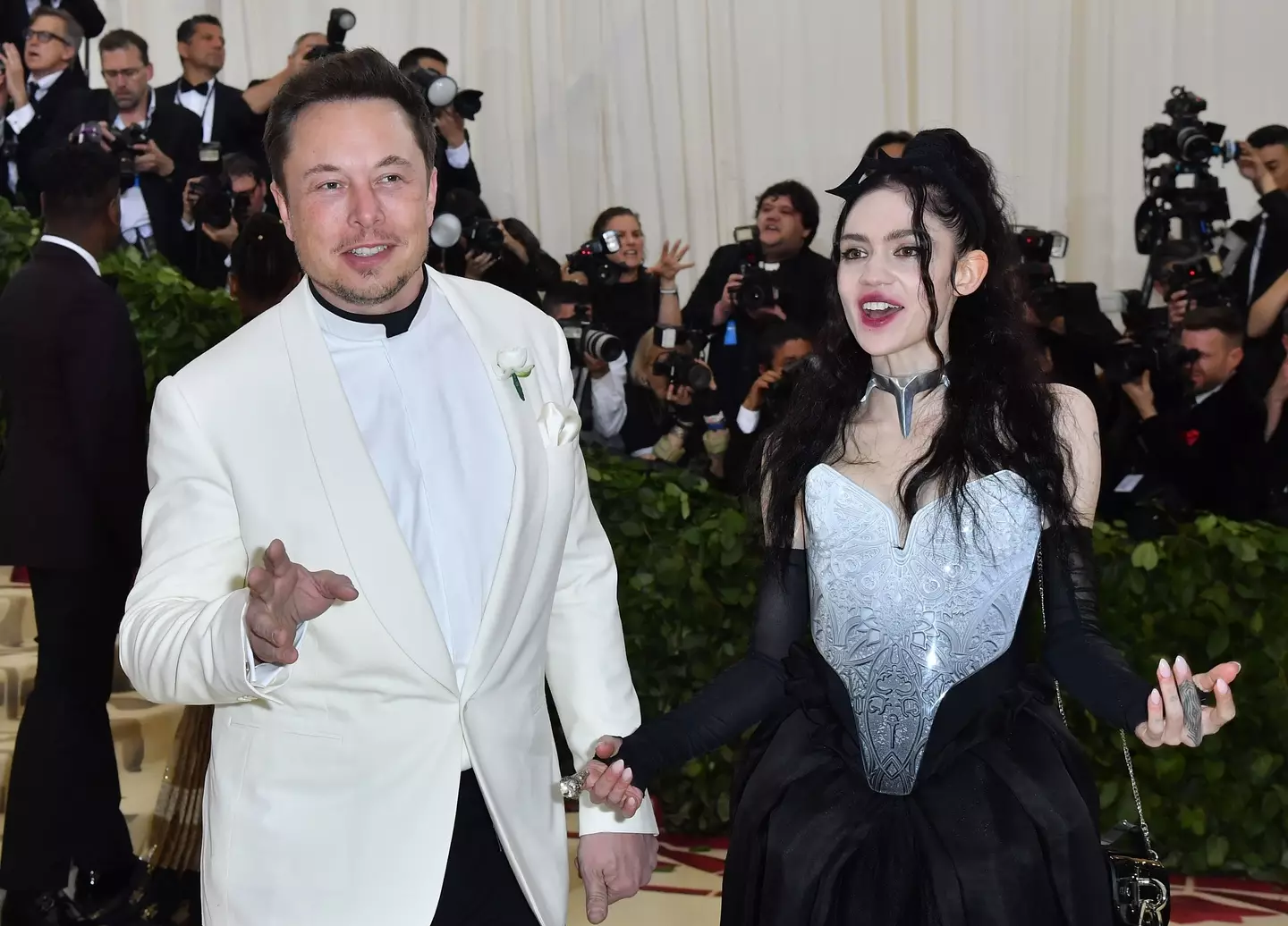 Elon Musk shares three children with singer Grimes (ANGELA WEISS/AFP via Getty Images)