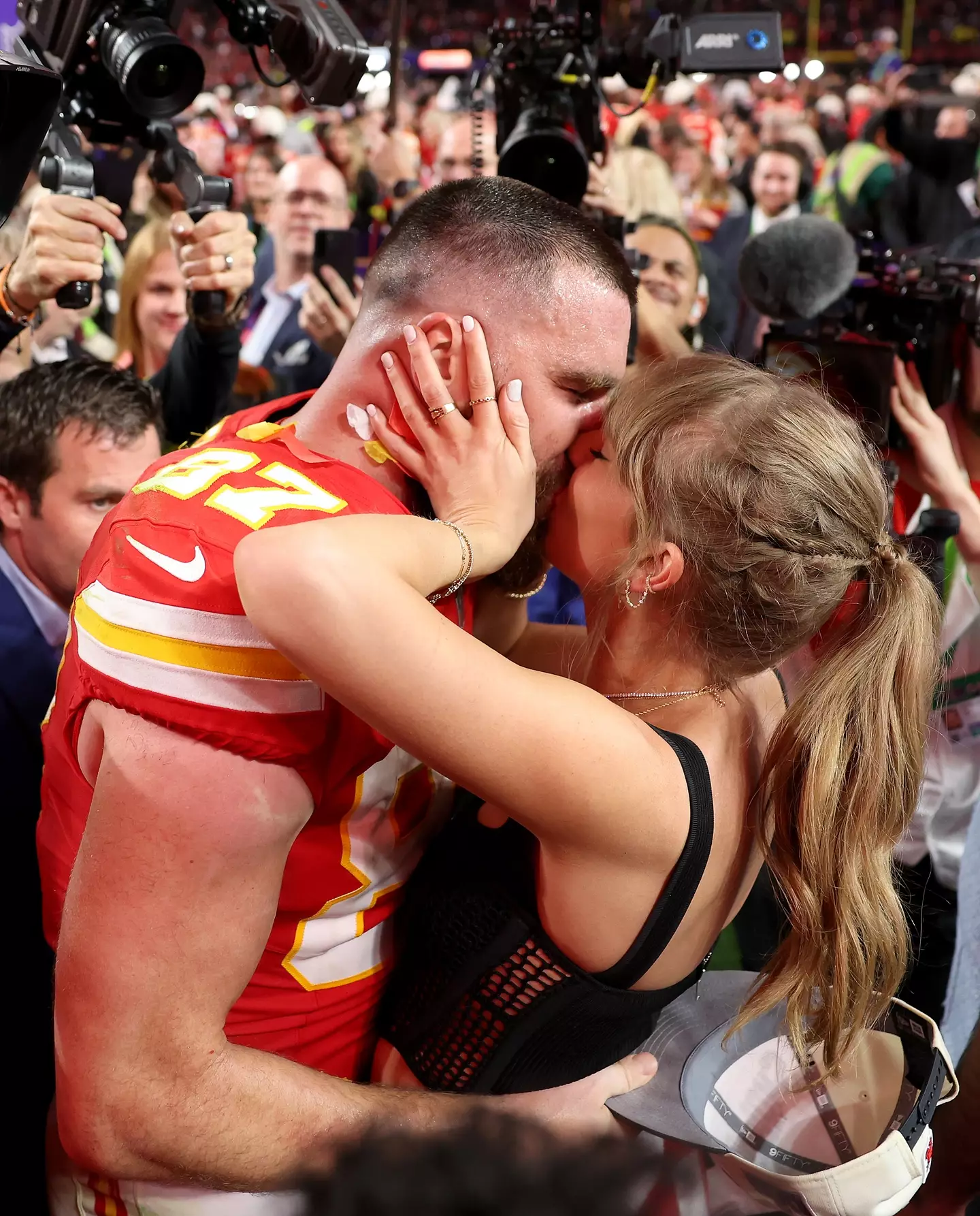 Travis Kelce and Taylor Swift celebrated after the Chiefs won.