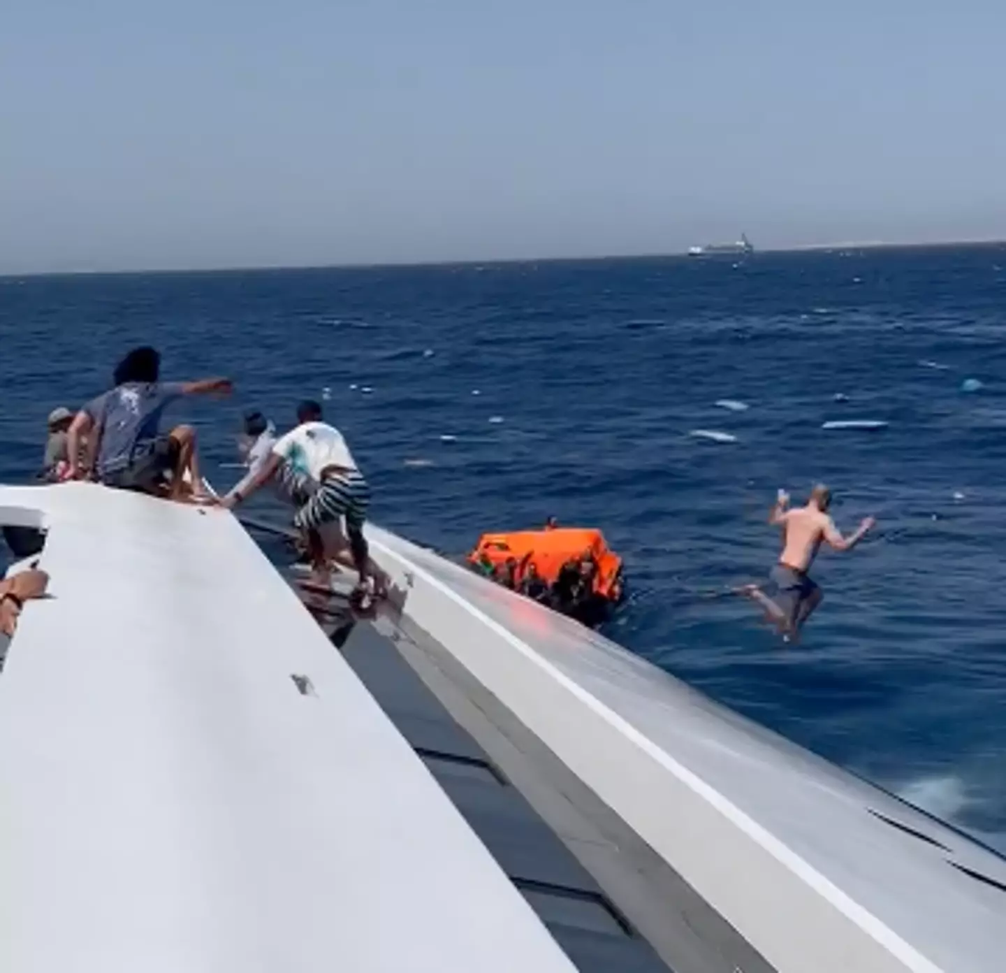 Passengers jumped from the boat to try and survive.
